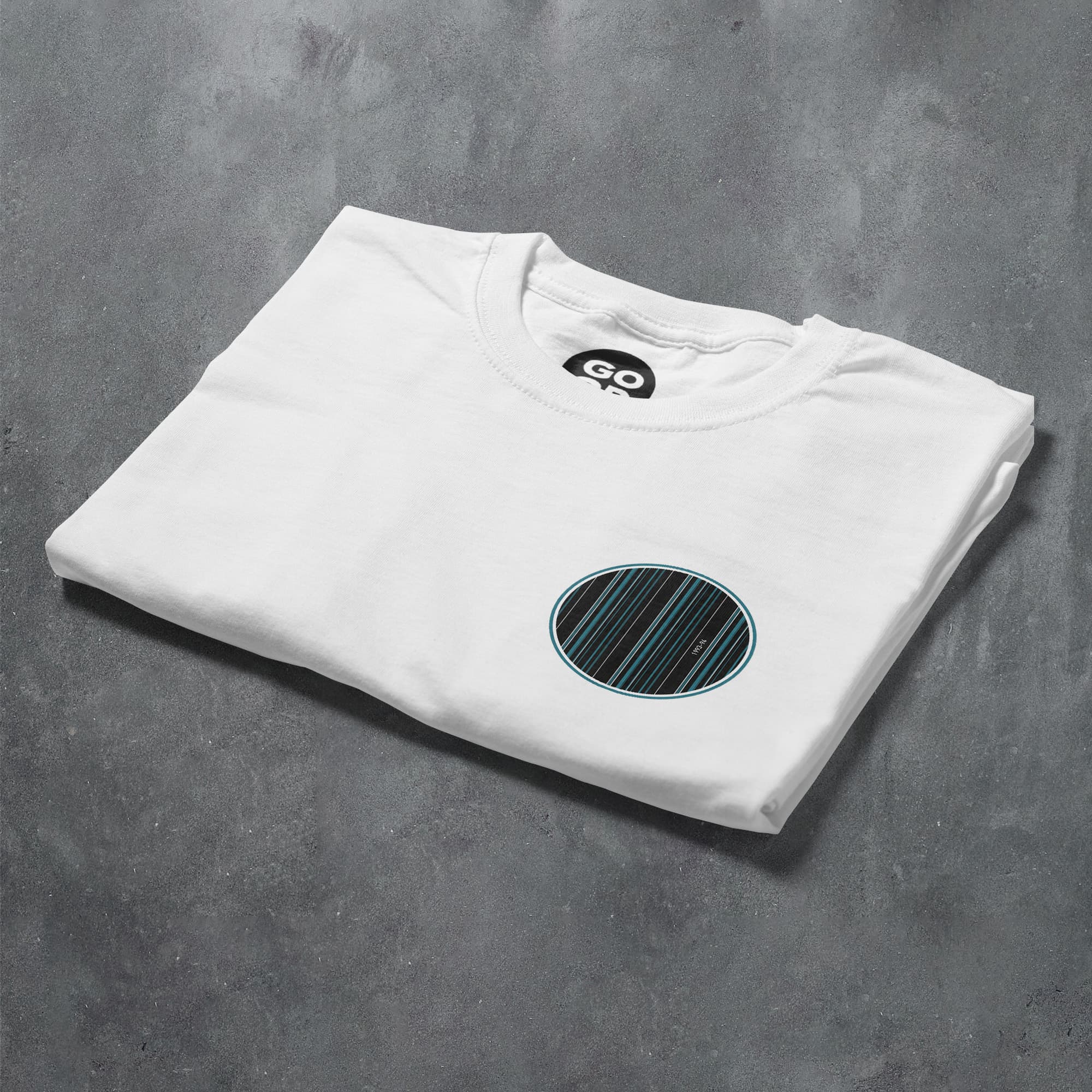 a white t - shirt with a green circle on it