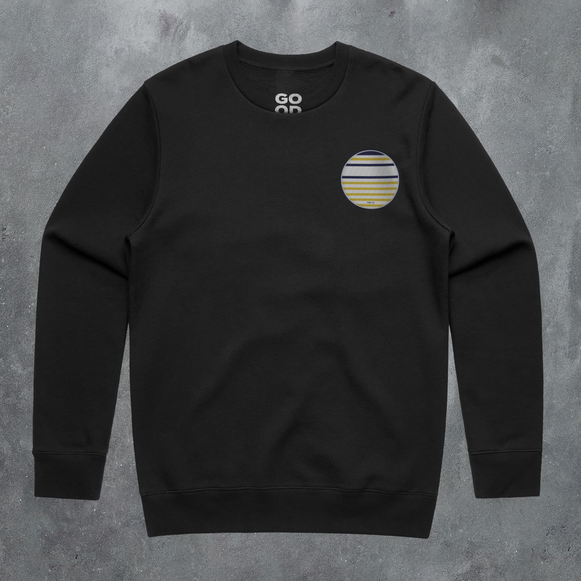 a black sweatshirt with a striped circle on the chest