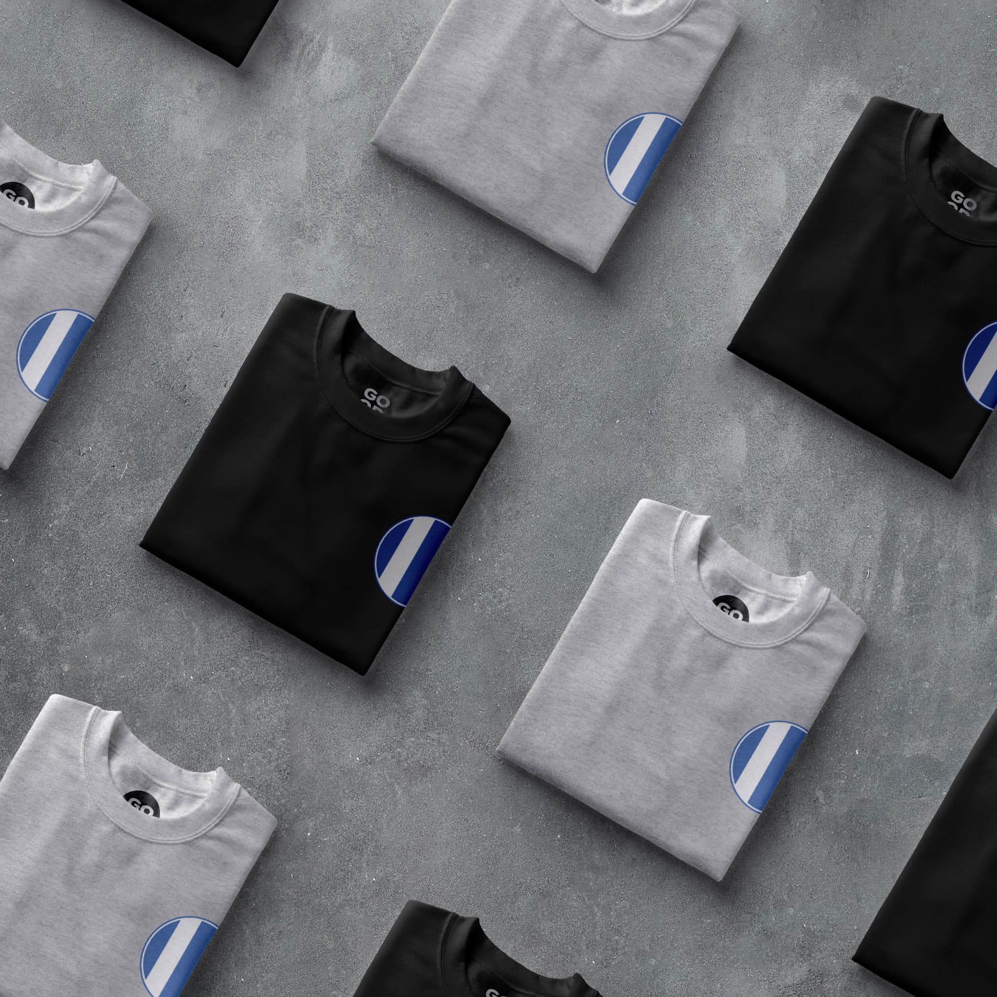 a group of t - shirts with blue and white stripes