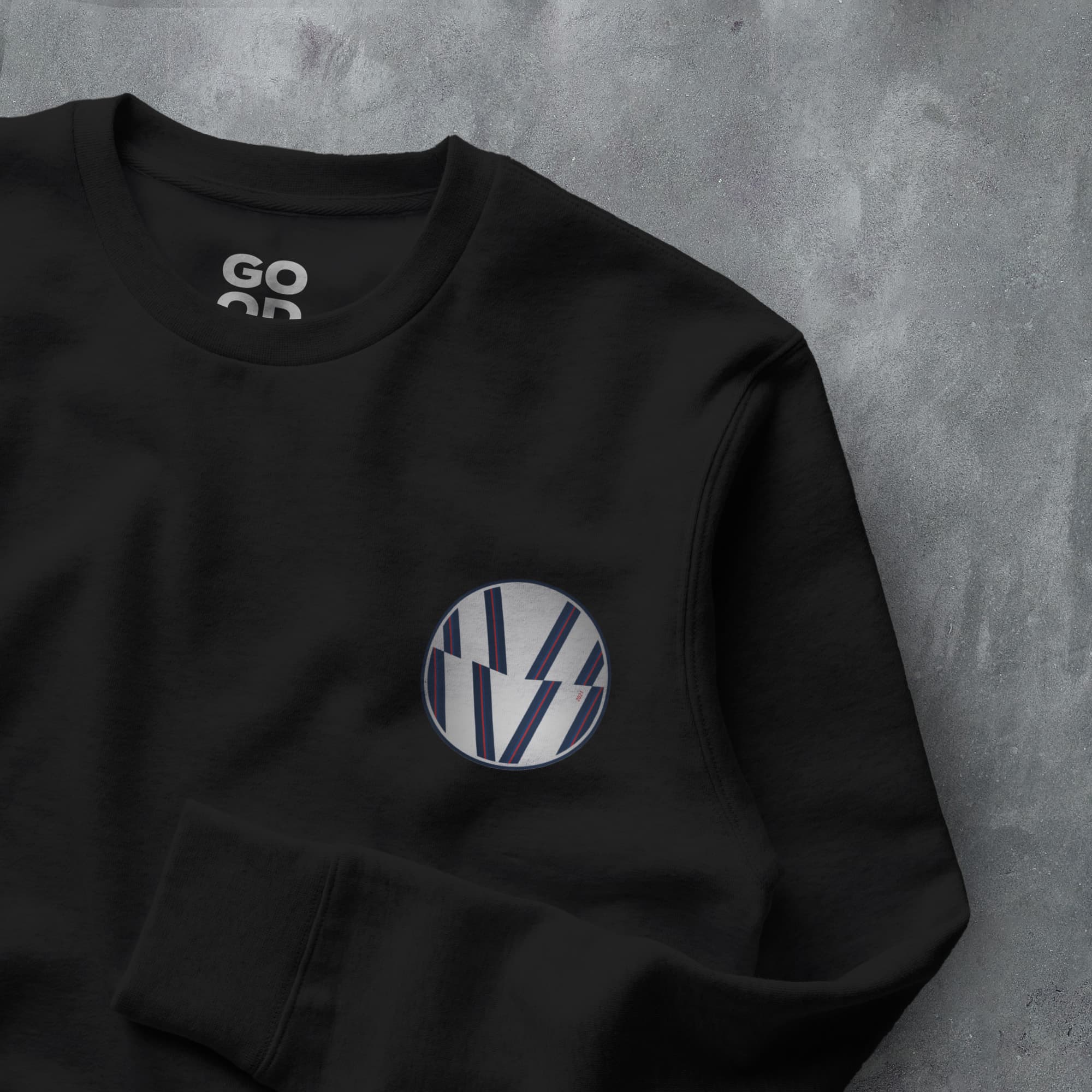 a black sweatshirt with a blue and white logo