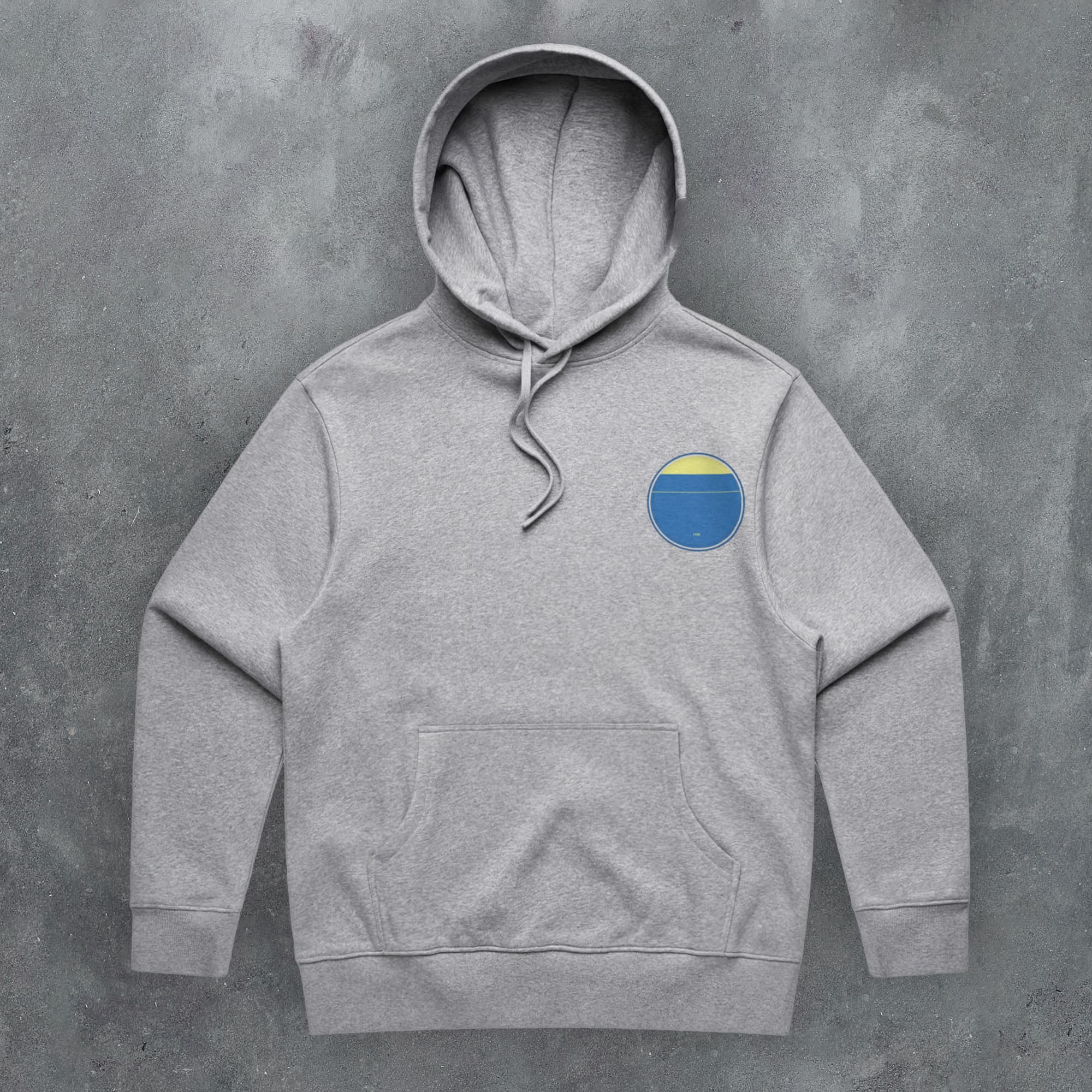 a grey hoodie with a blue and yellow circle on it