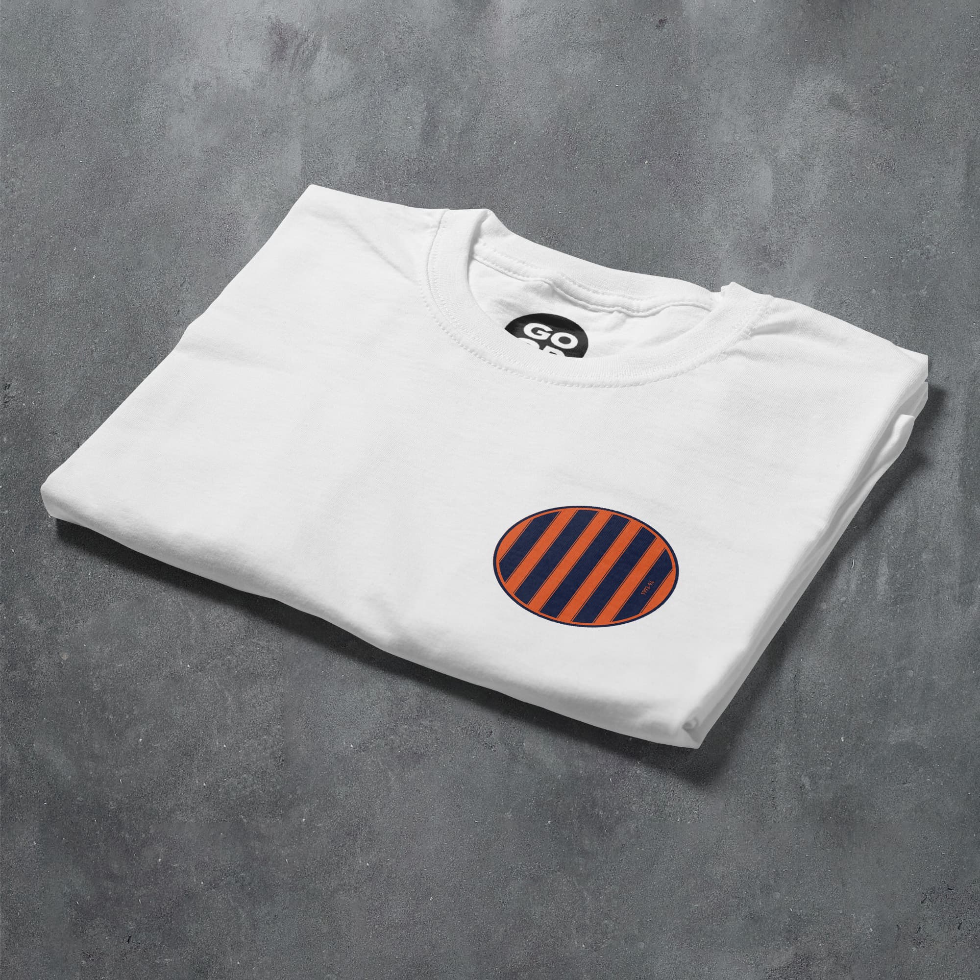 a white t - shirt with an orange and black stripe on it