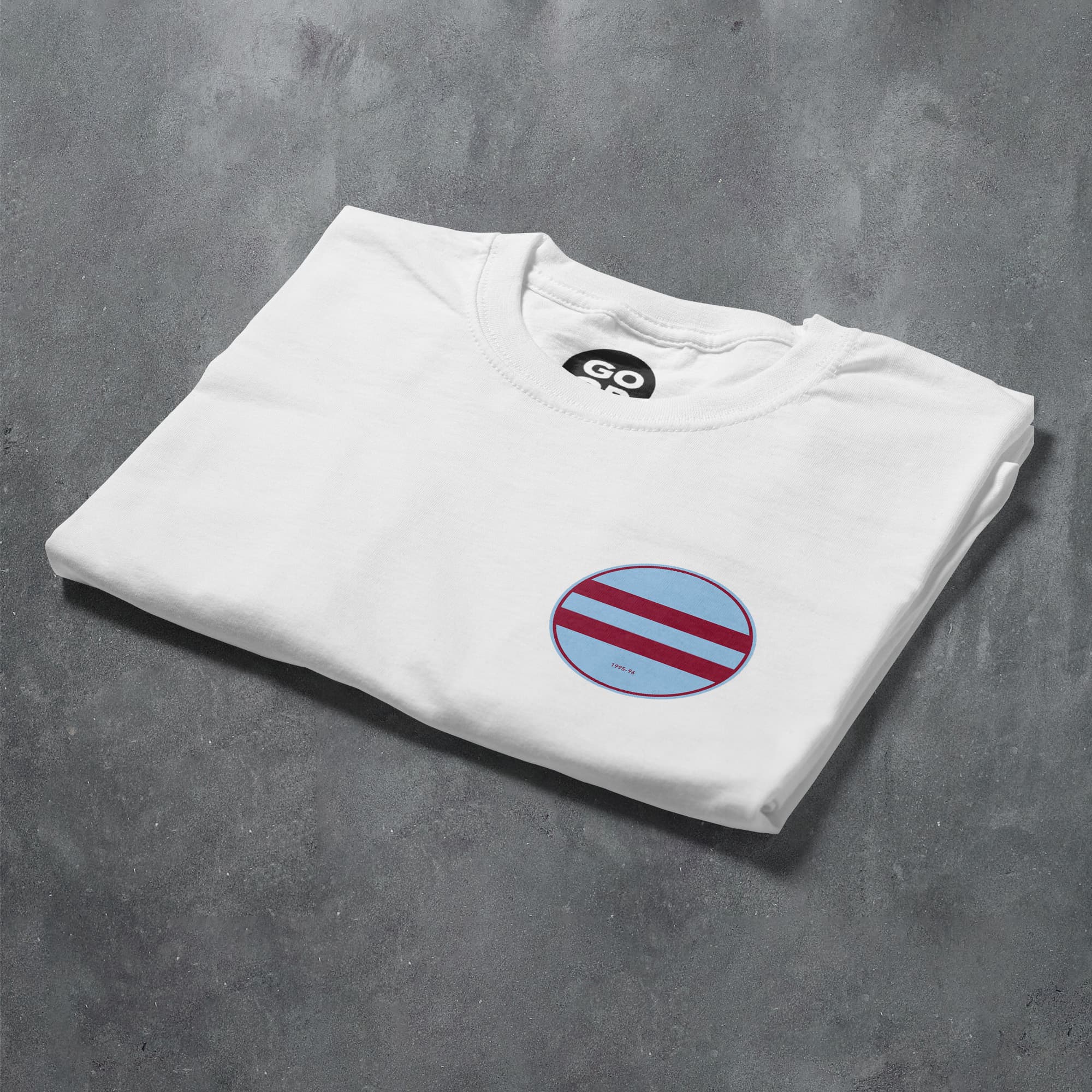 a white t - shirt with a red and blue circle on it