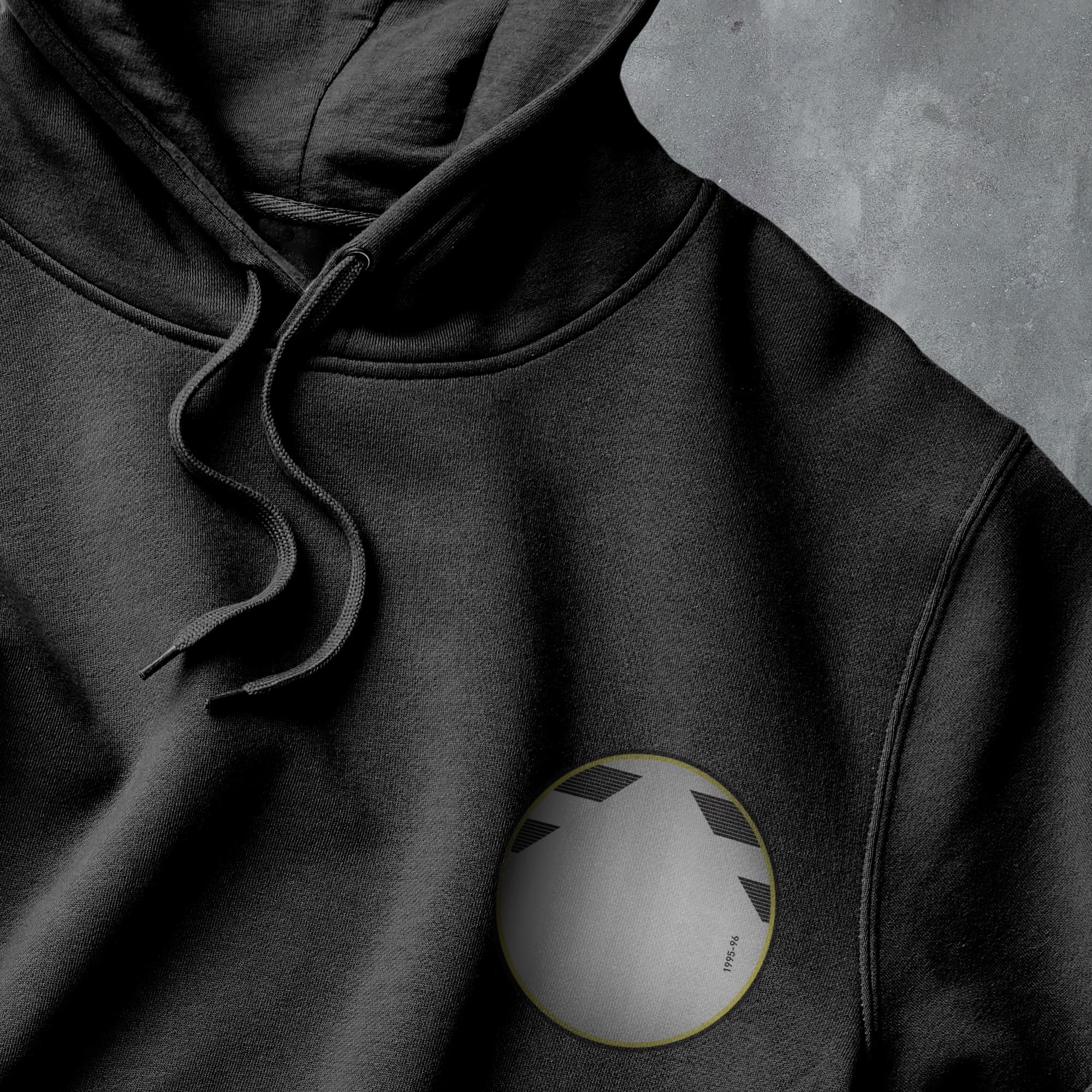 a black hoodie with a white circle on it