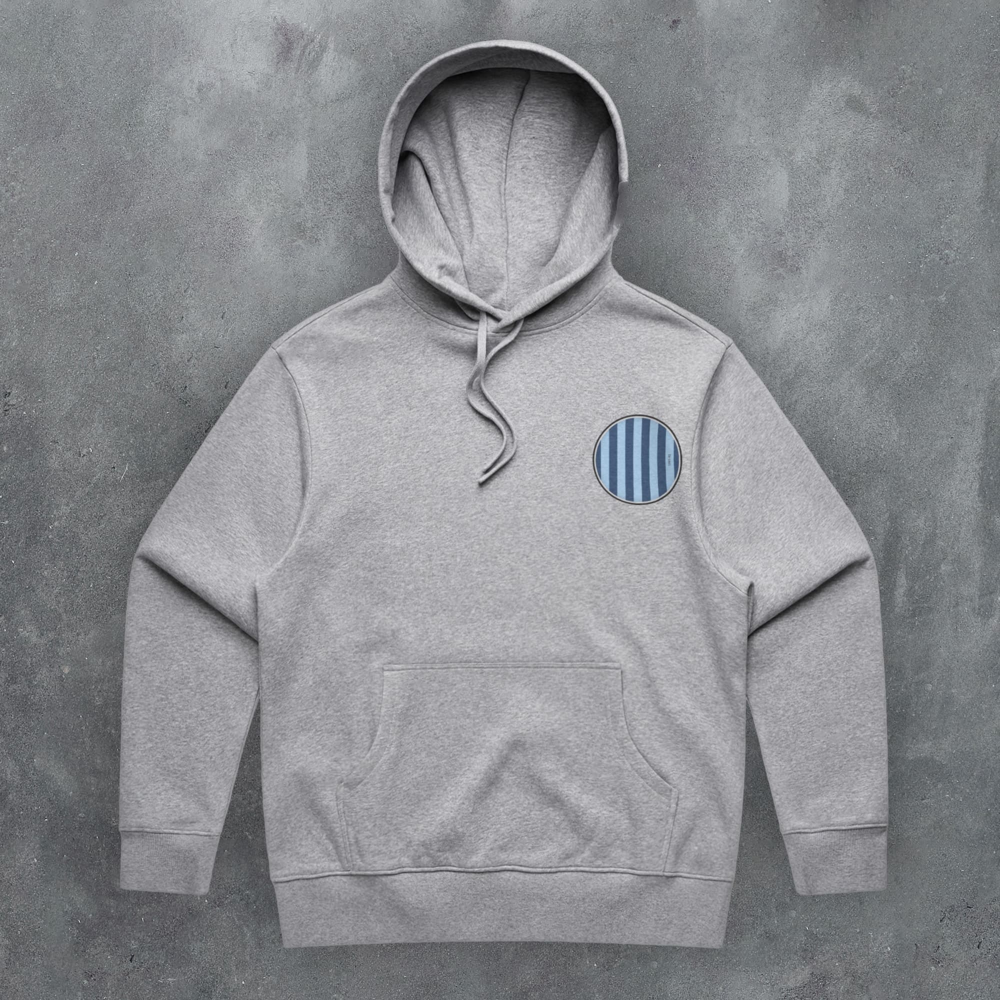 a grey hoodie with a blue circle on it
