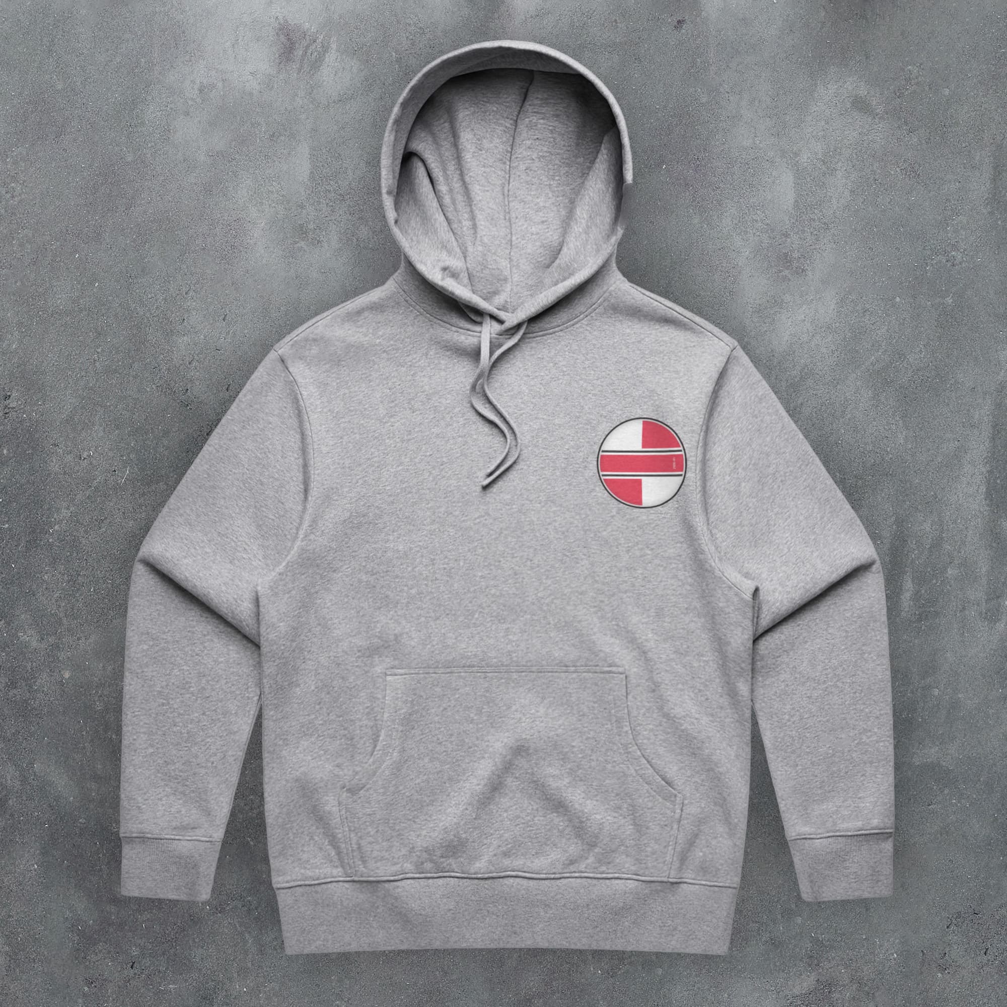 a grey hoodie with a red and white cross on it