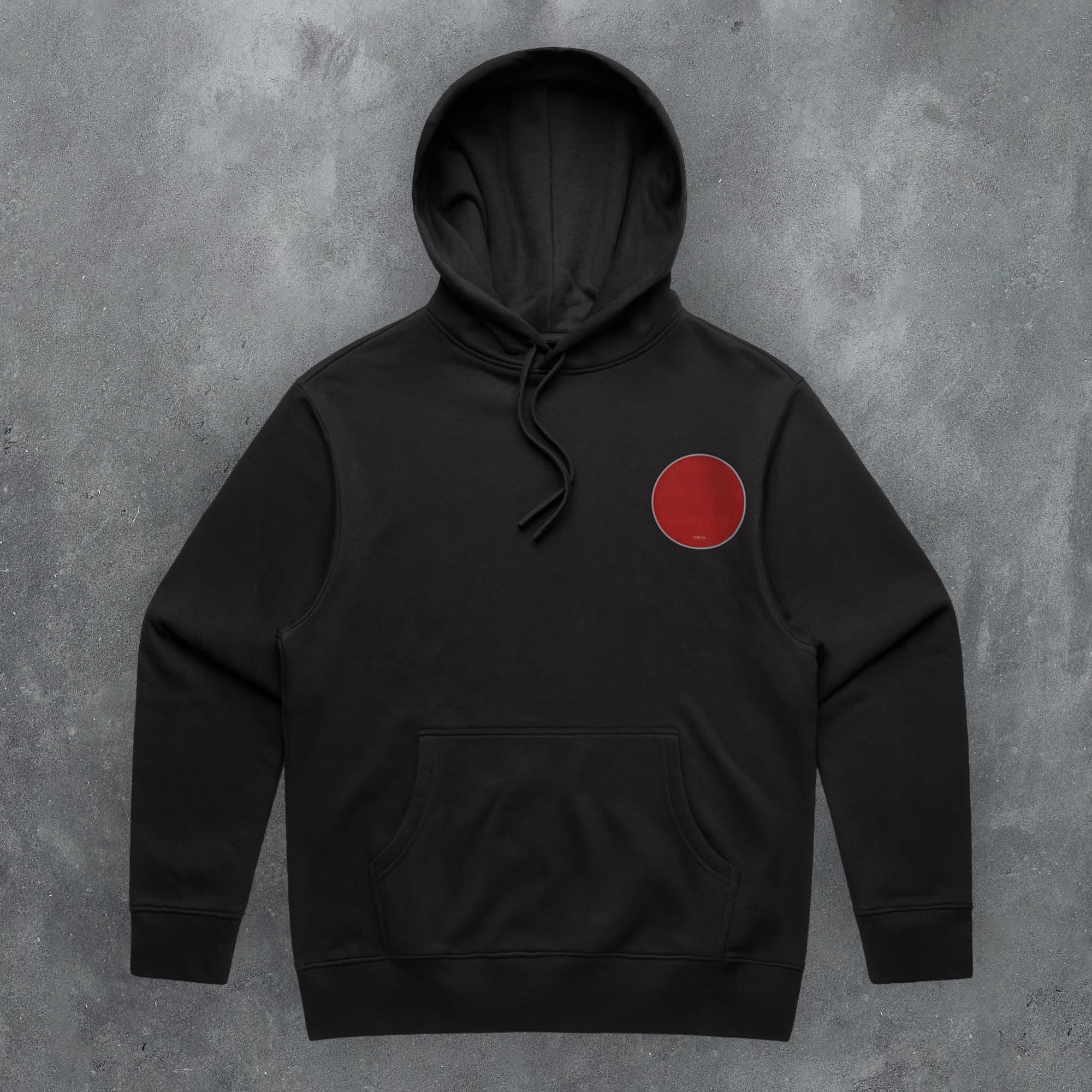 a black hoodie with a red circle on it