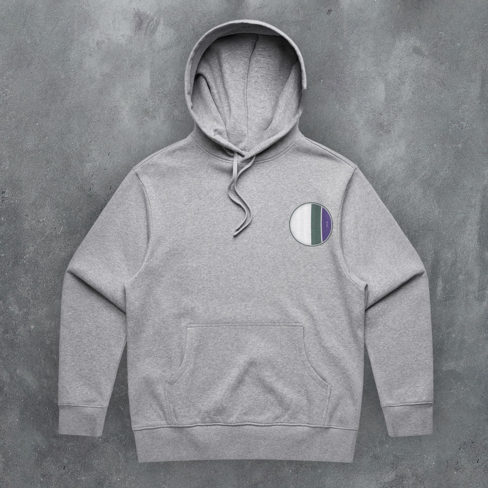 a grey hoodie with a green, white and blue patch on it