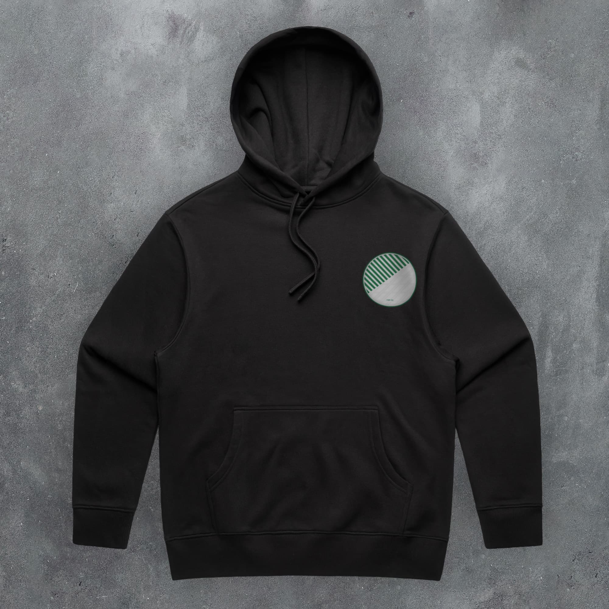 a black hoodie with a green circle on it