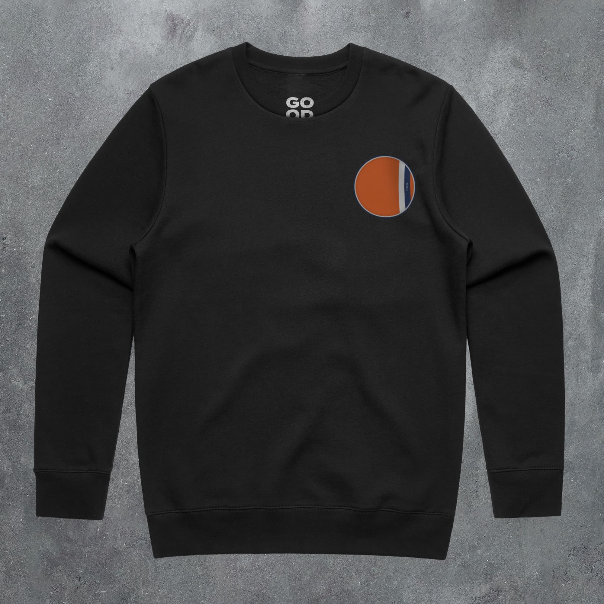 a black sweatshirt with an orange and blue circle on it