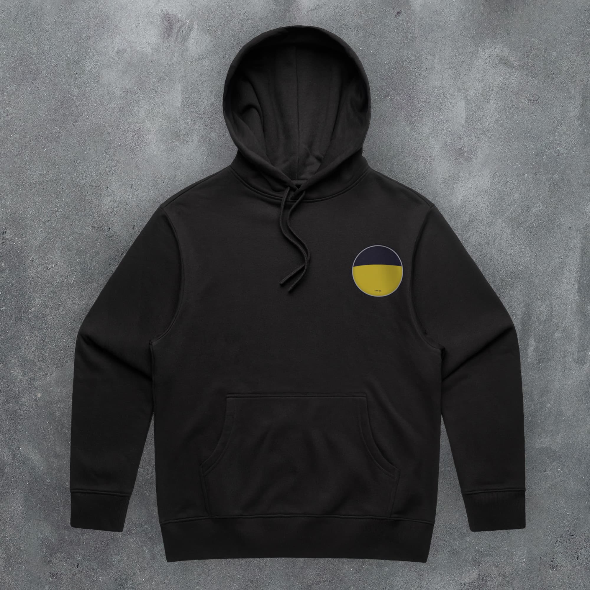 a black hoodie with a yellow circle on it