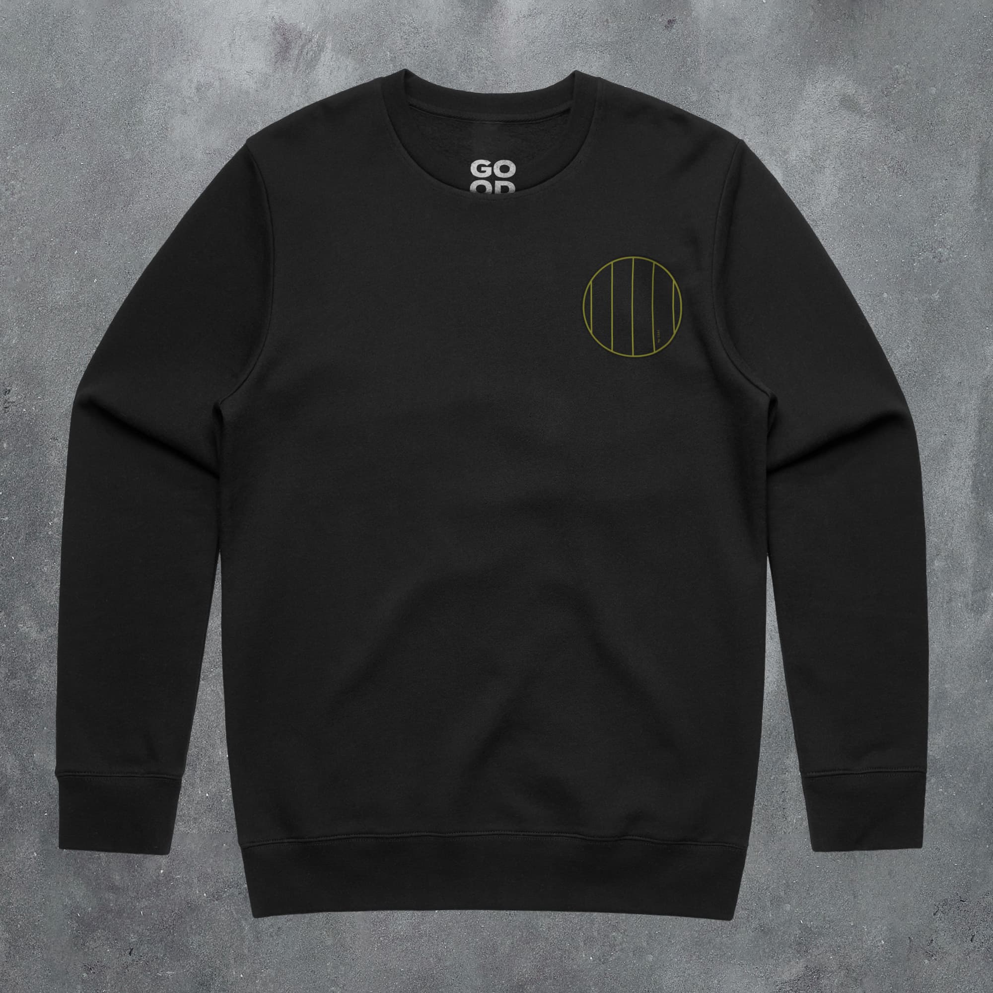 a black sweatshirt with a green circle on it