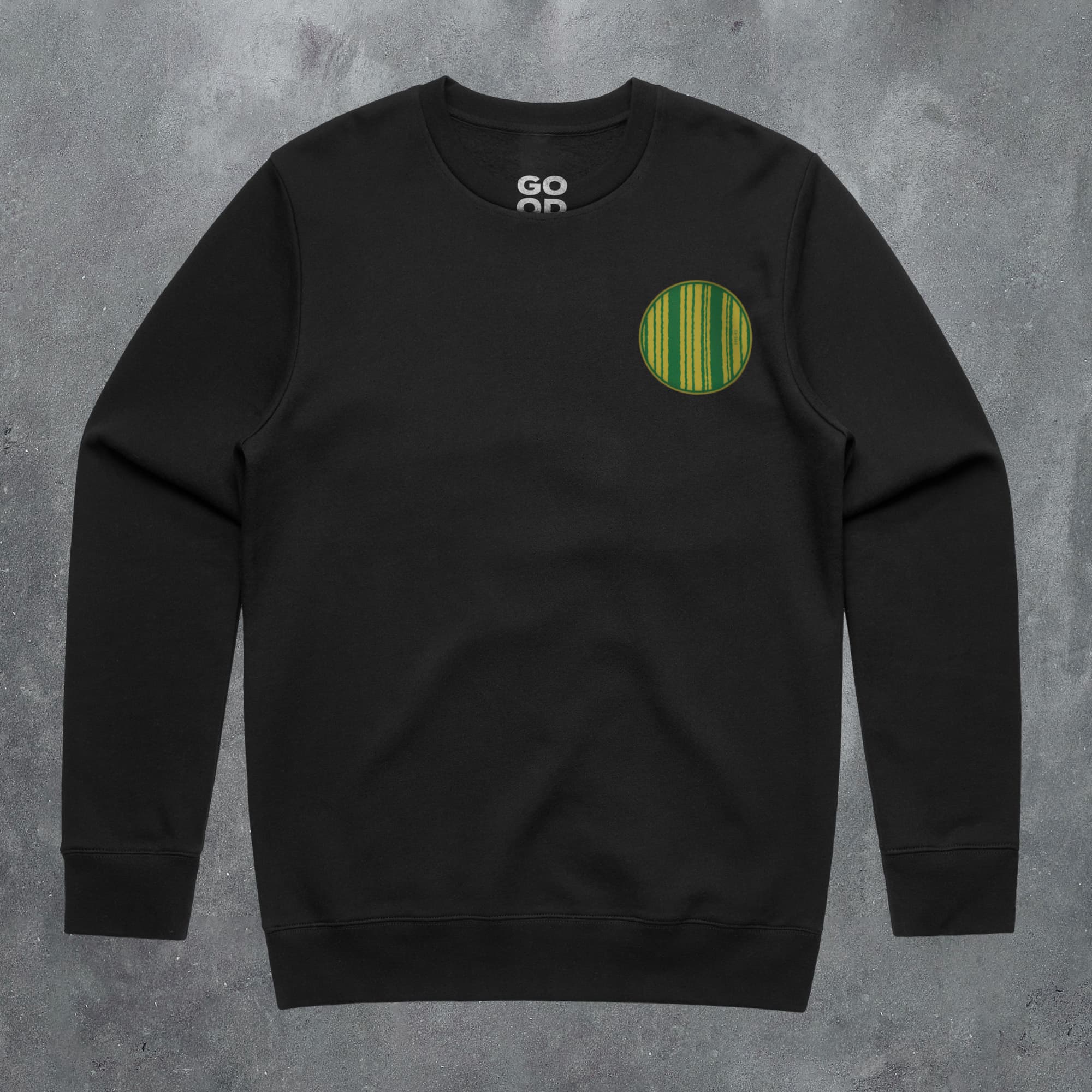 a black sweatshirt with a green circle on it