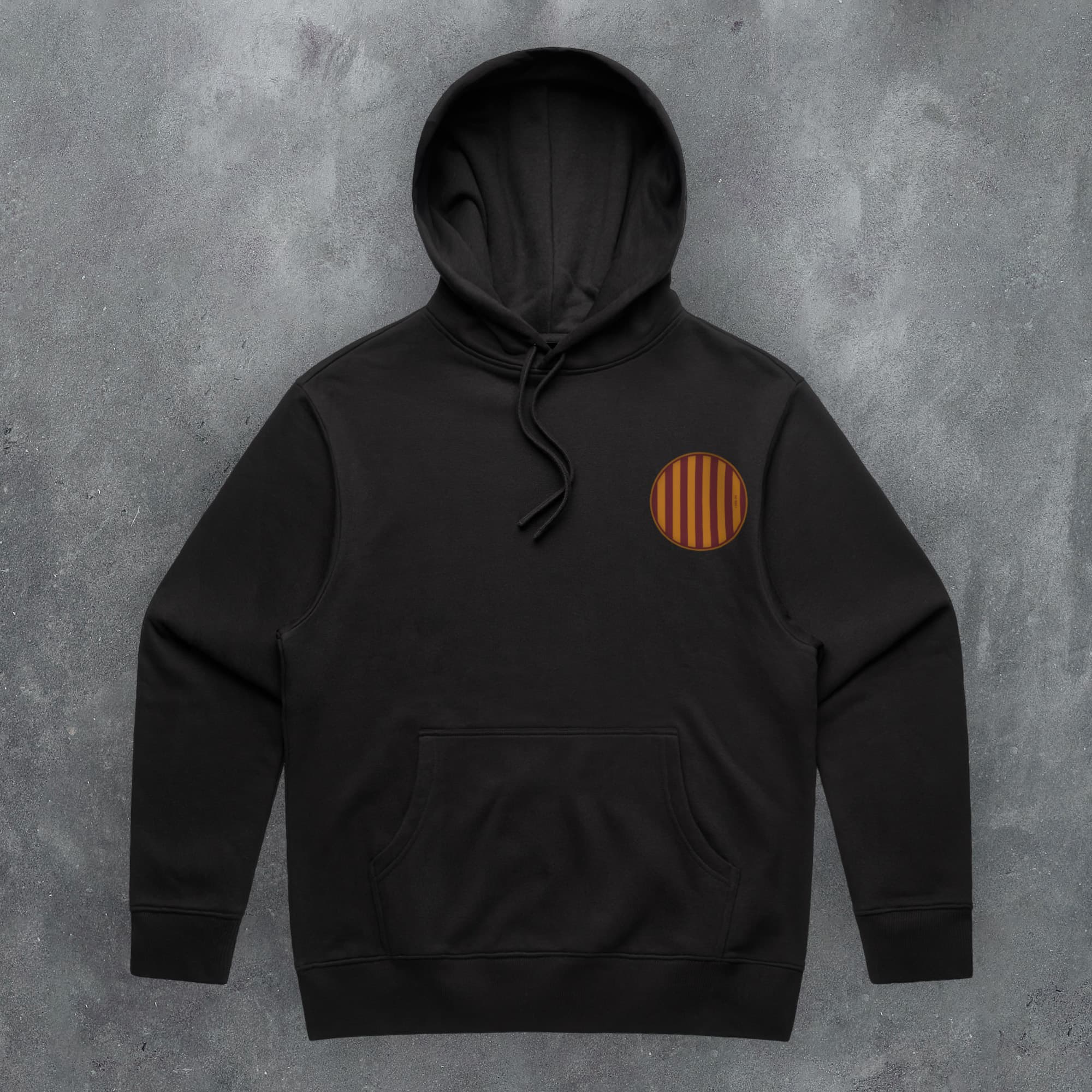 a black hoodie with an orange circle on it