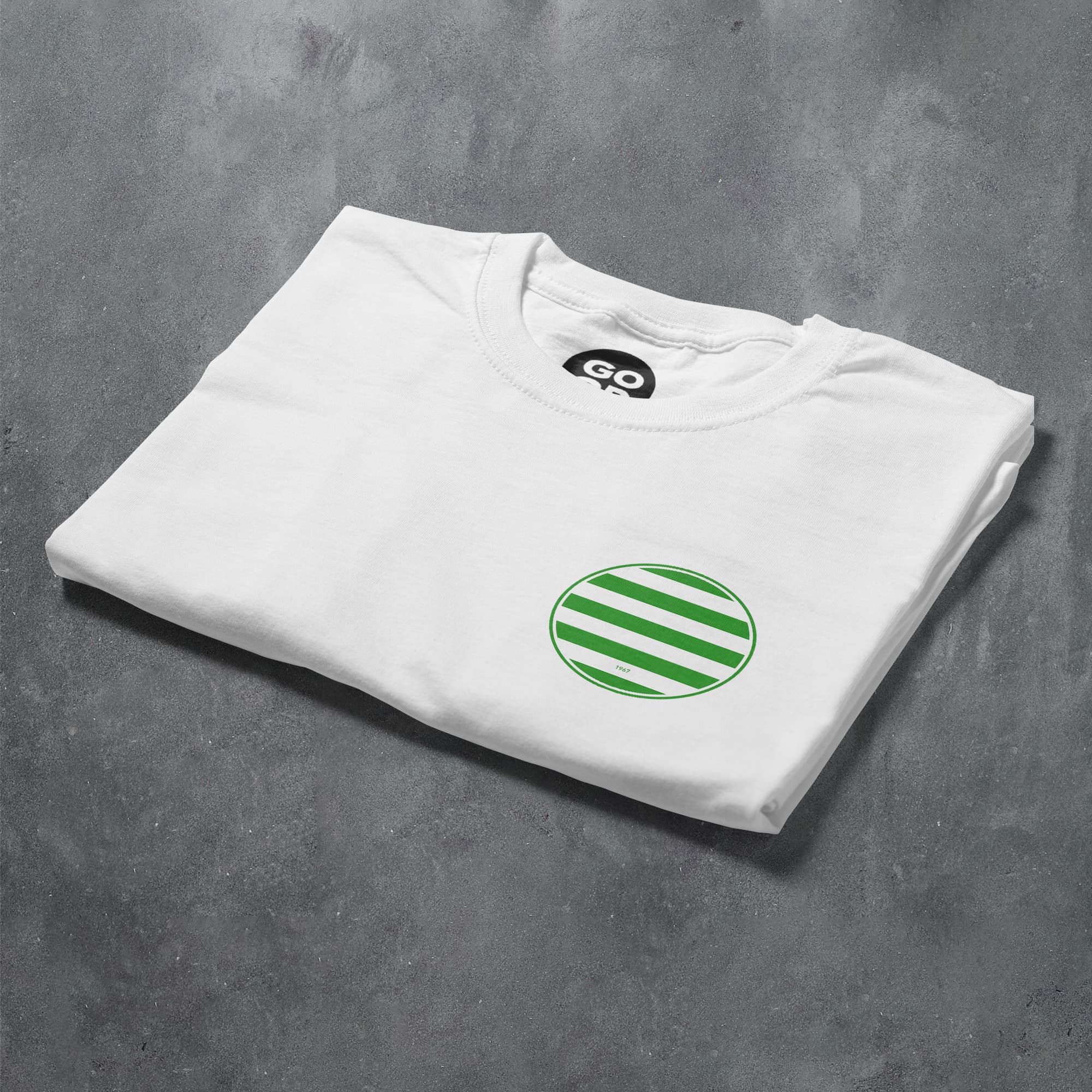 a white t - shirt with a green circle on it