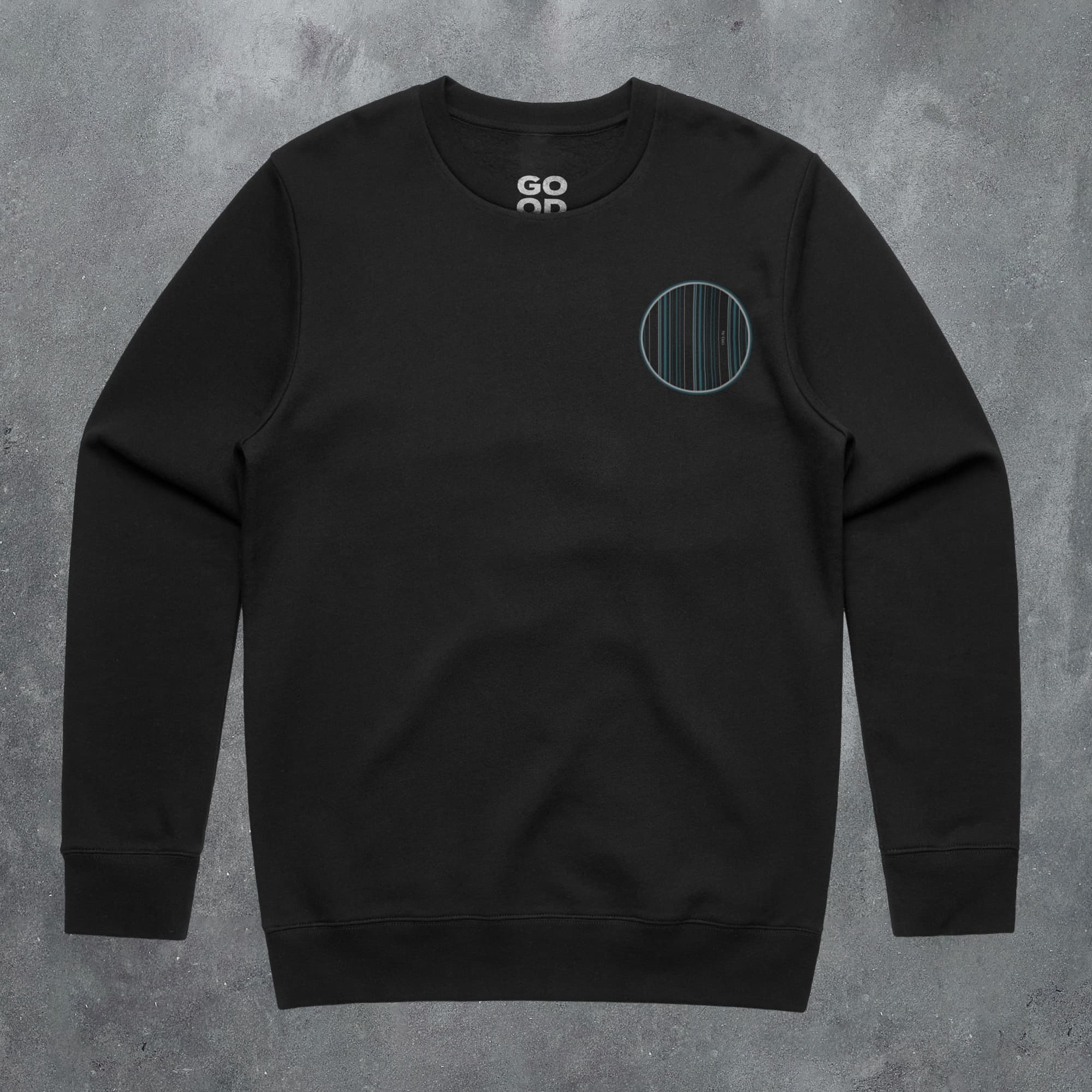 a black sweatshirt with a green circle on it