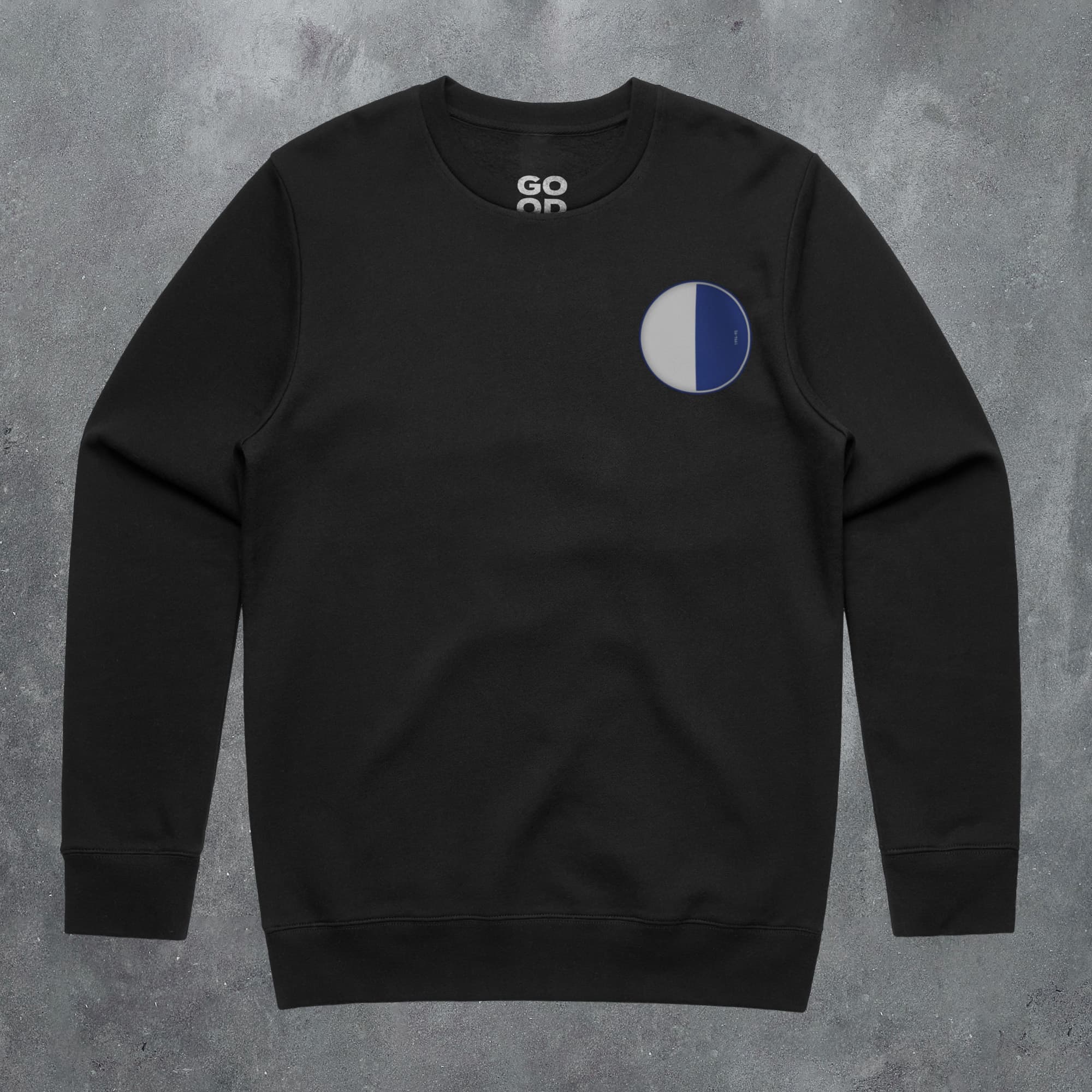 a black sweatshirt with a blue and white circle on it