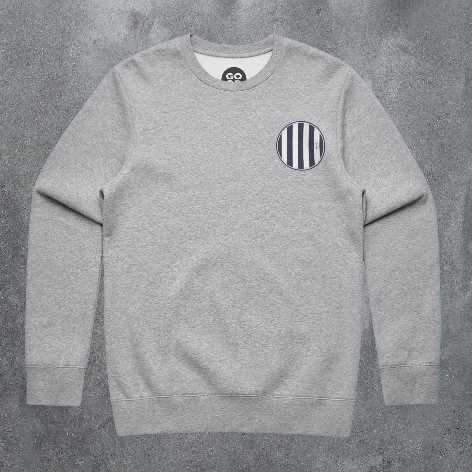 a grey sweatshirt with black and white stripes on it