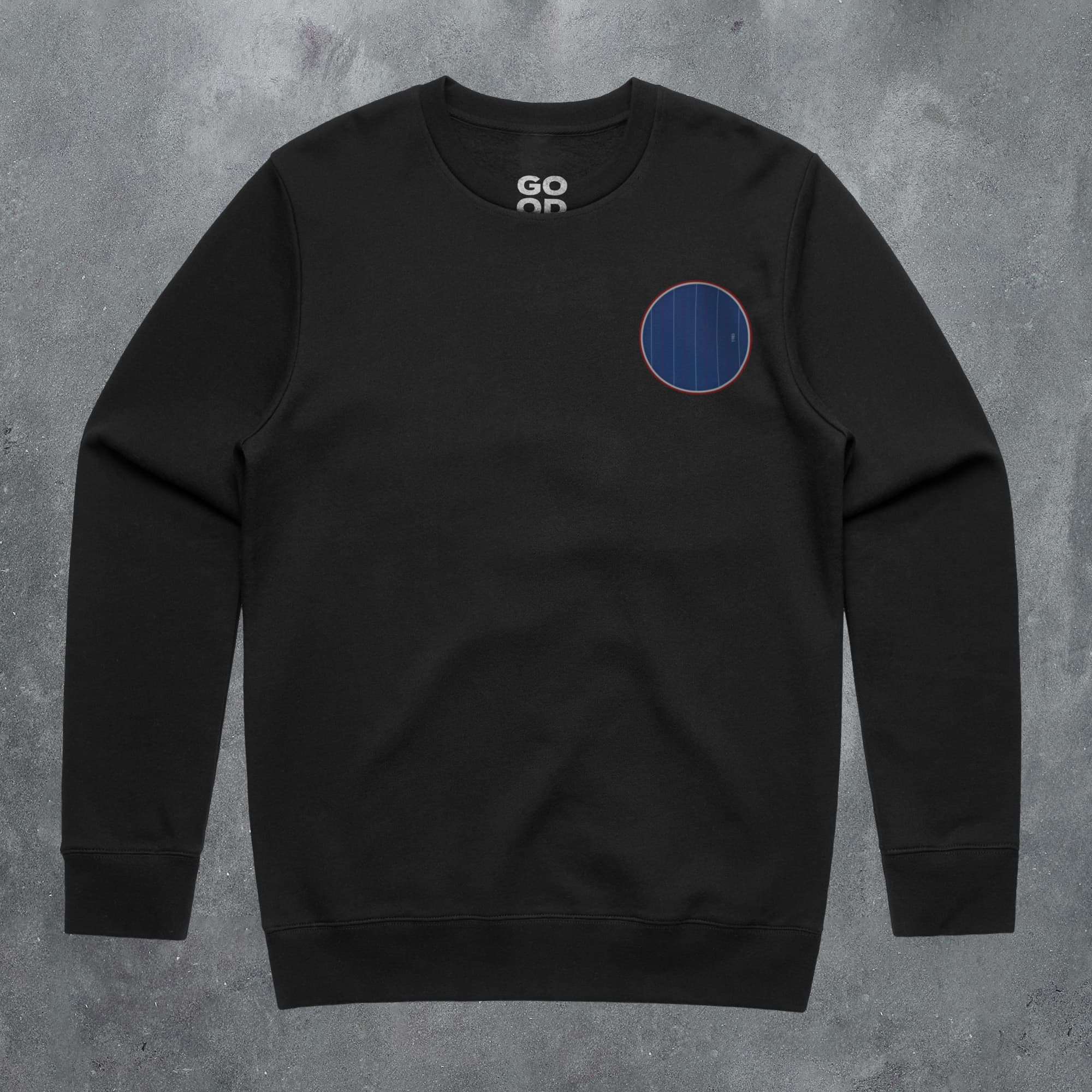 a black sweatshirt with a blue circle on it