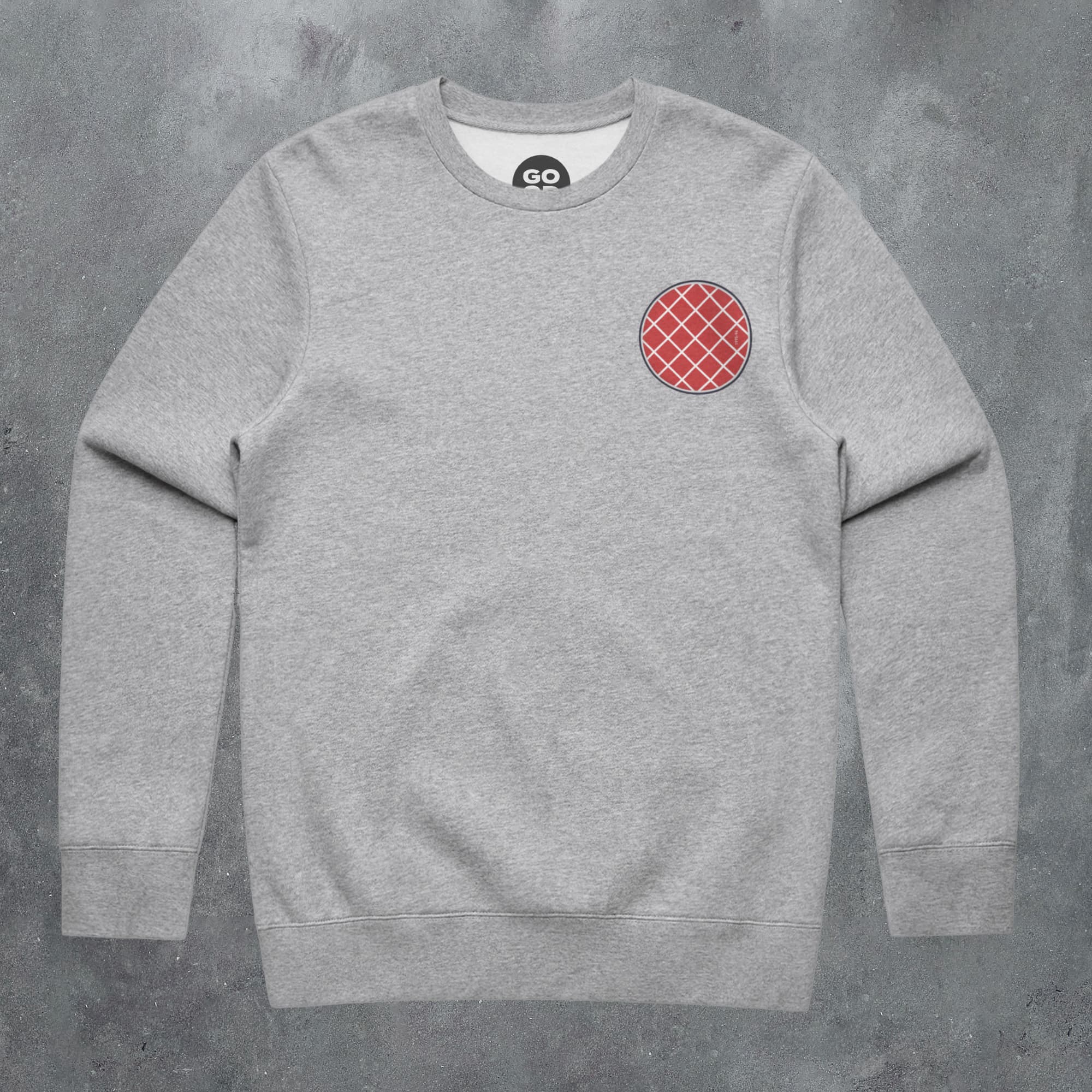 a grey sweatshirt with a red circle on it