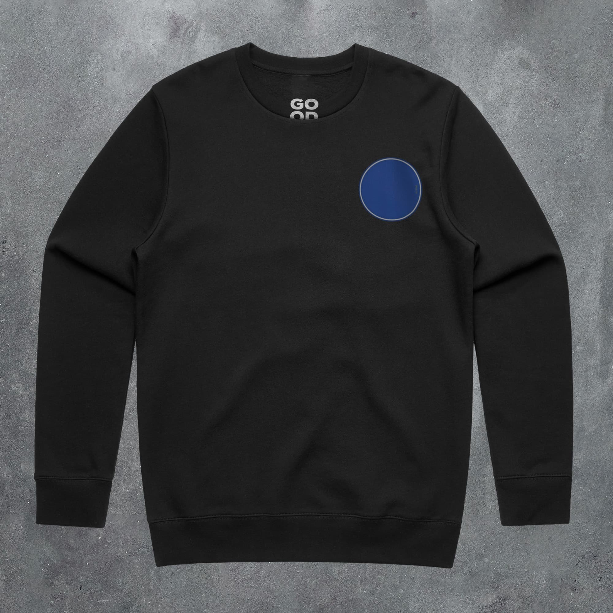 a black sweatshirt with a blue circle on it