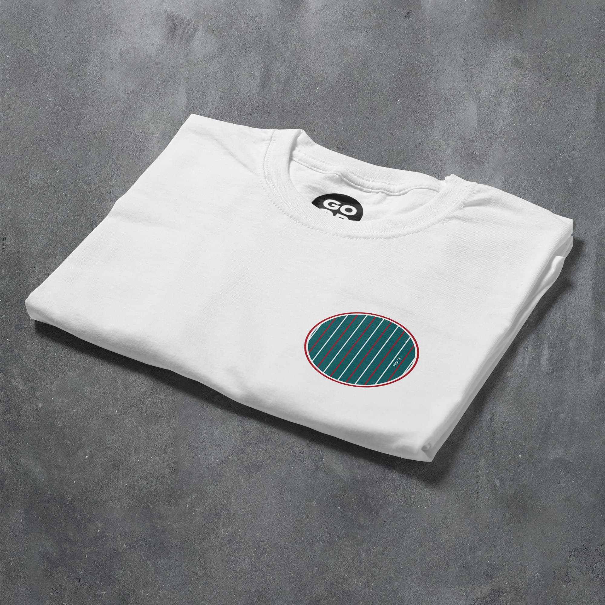 a white t - shirt with a green circle on it