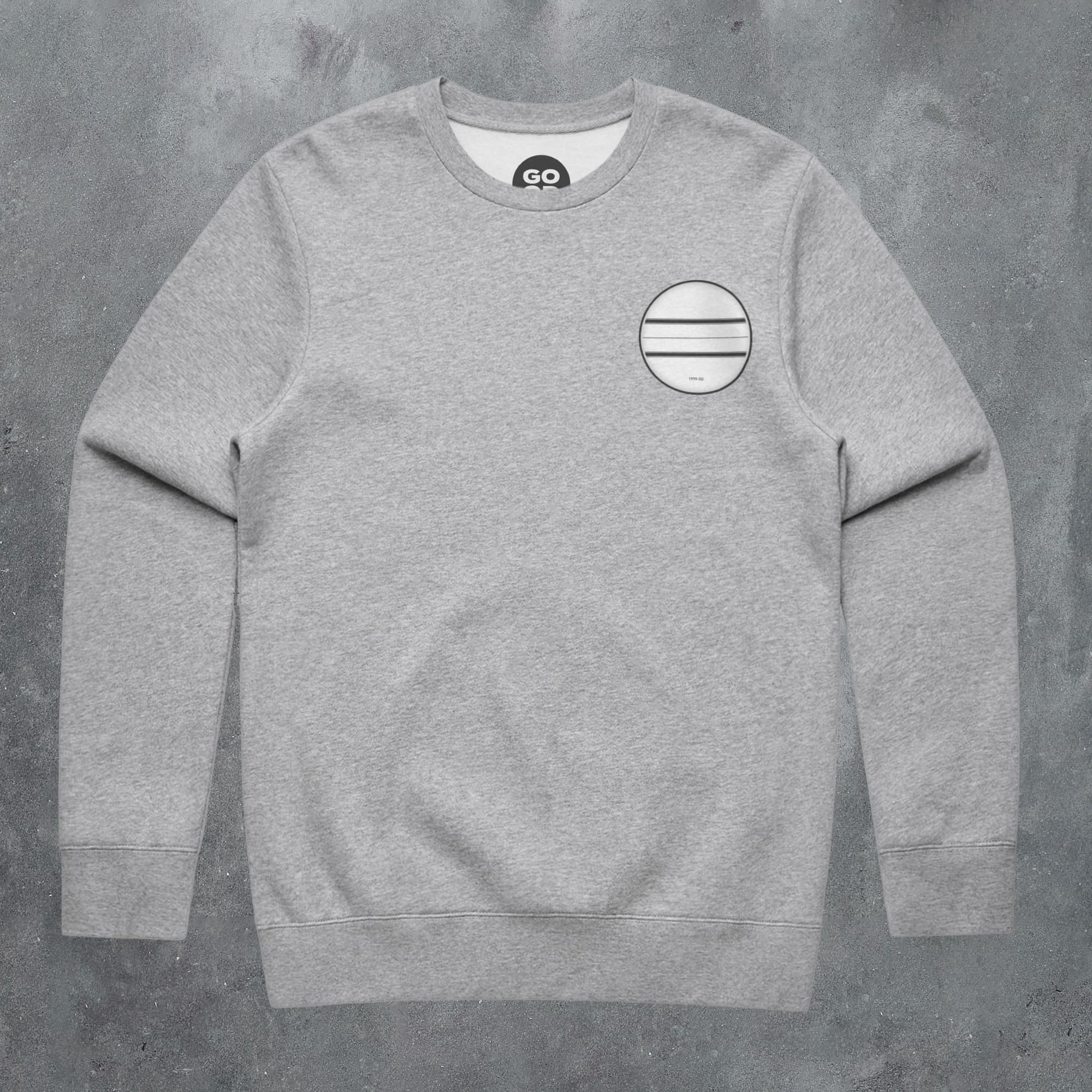a grey sweatshirt with a white stripe on the chest