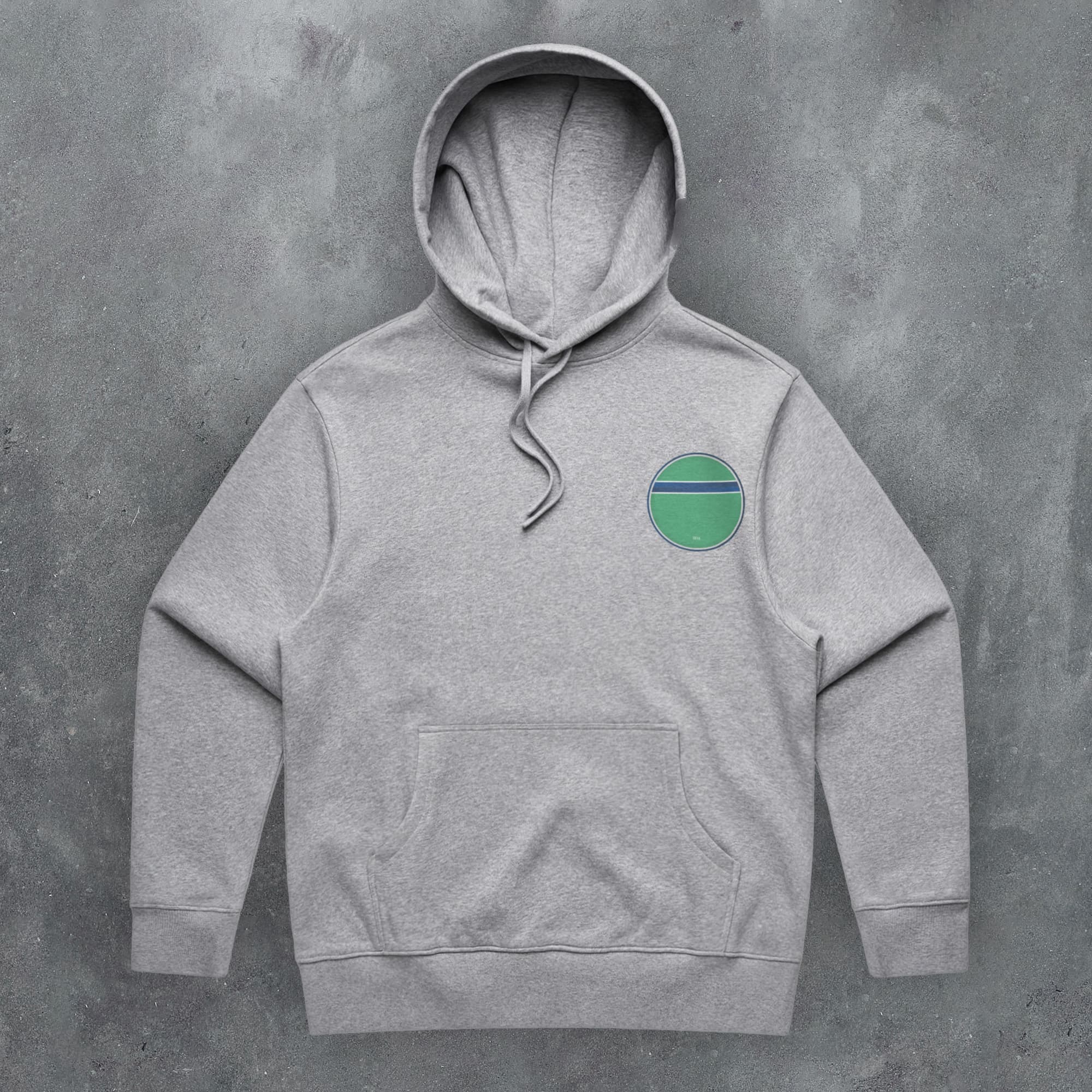 a grey hoodie with a green circle on it
