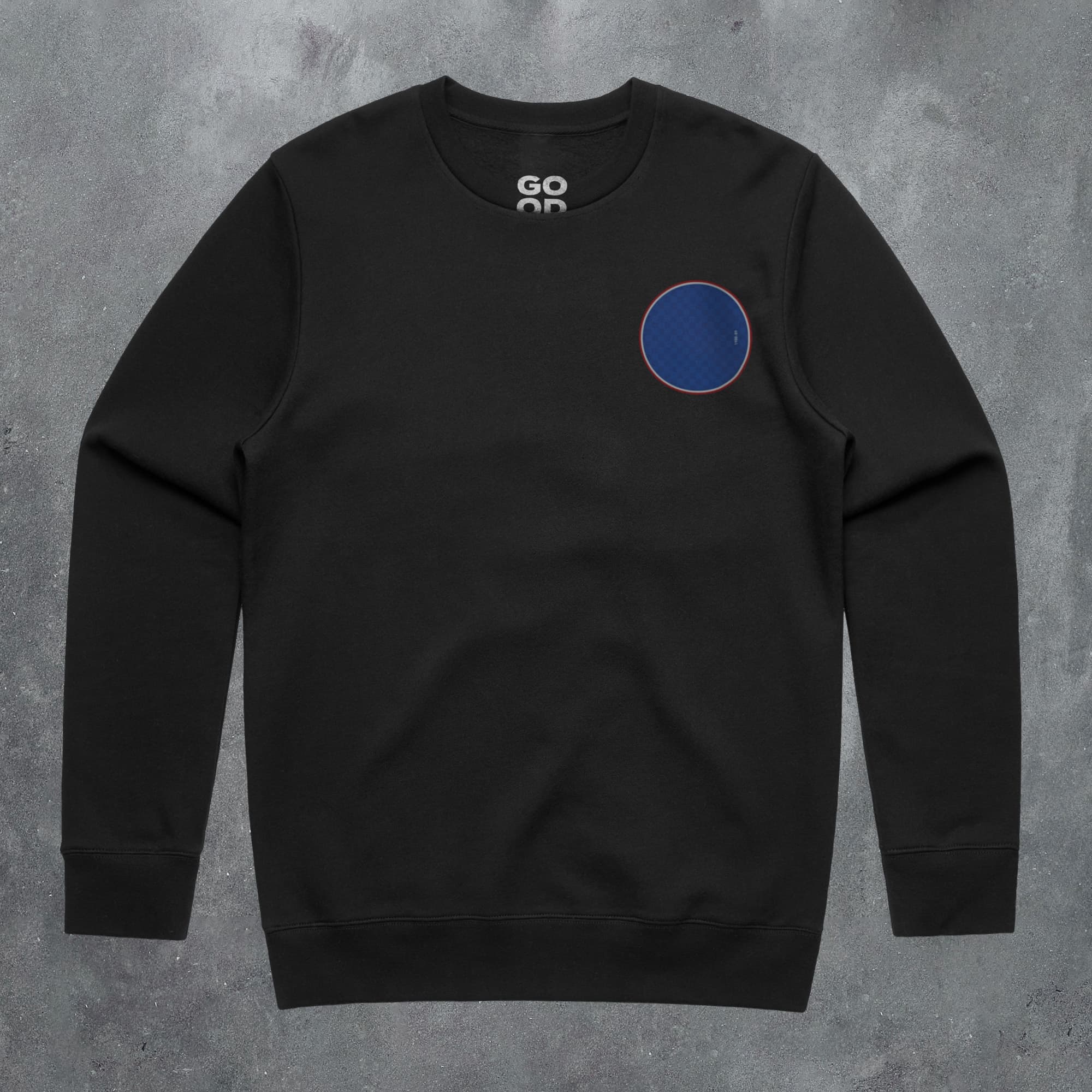 a black sweatshirt with a blue circle on it