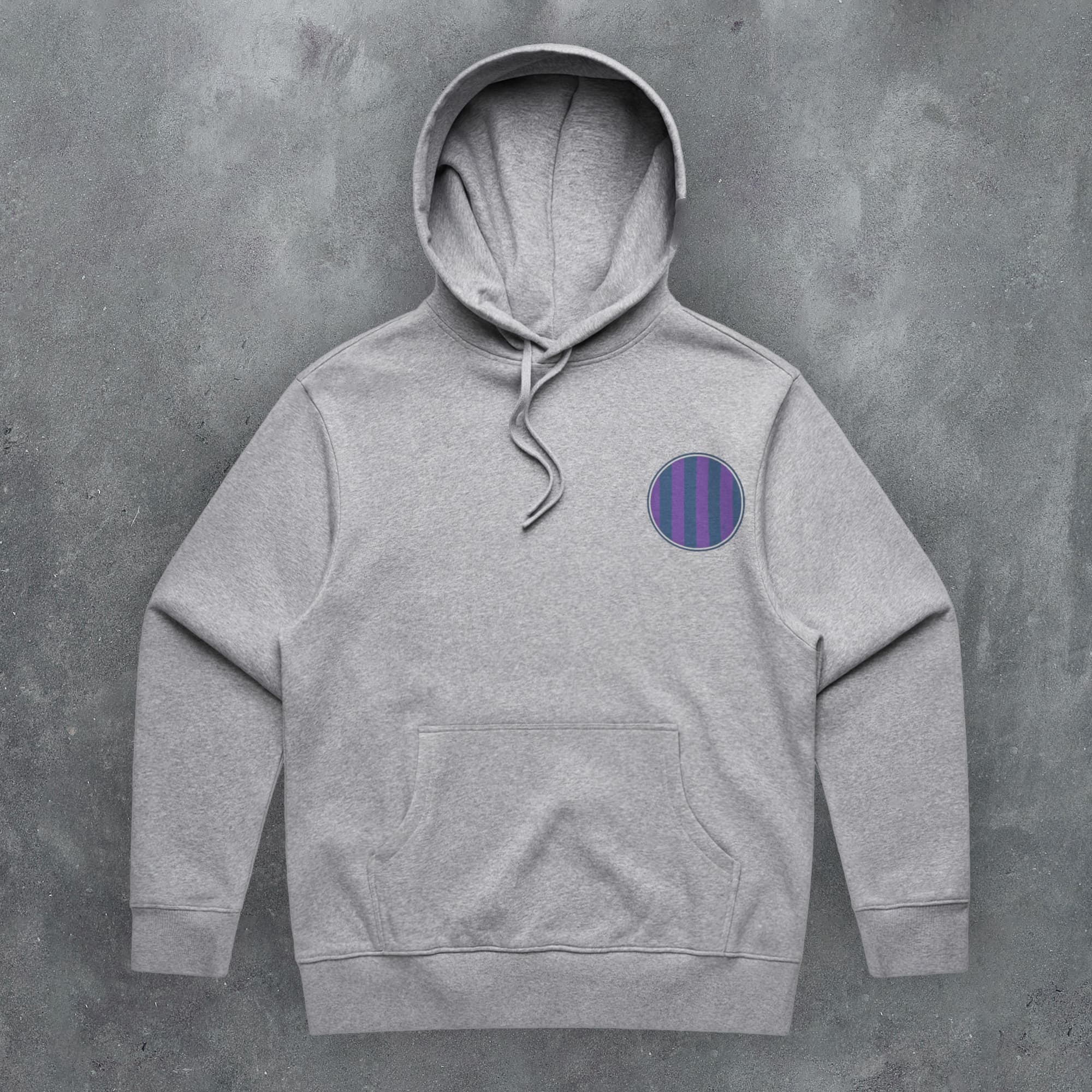 a grey hoodie with a purple circle on the front
