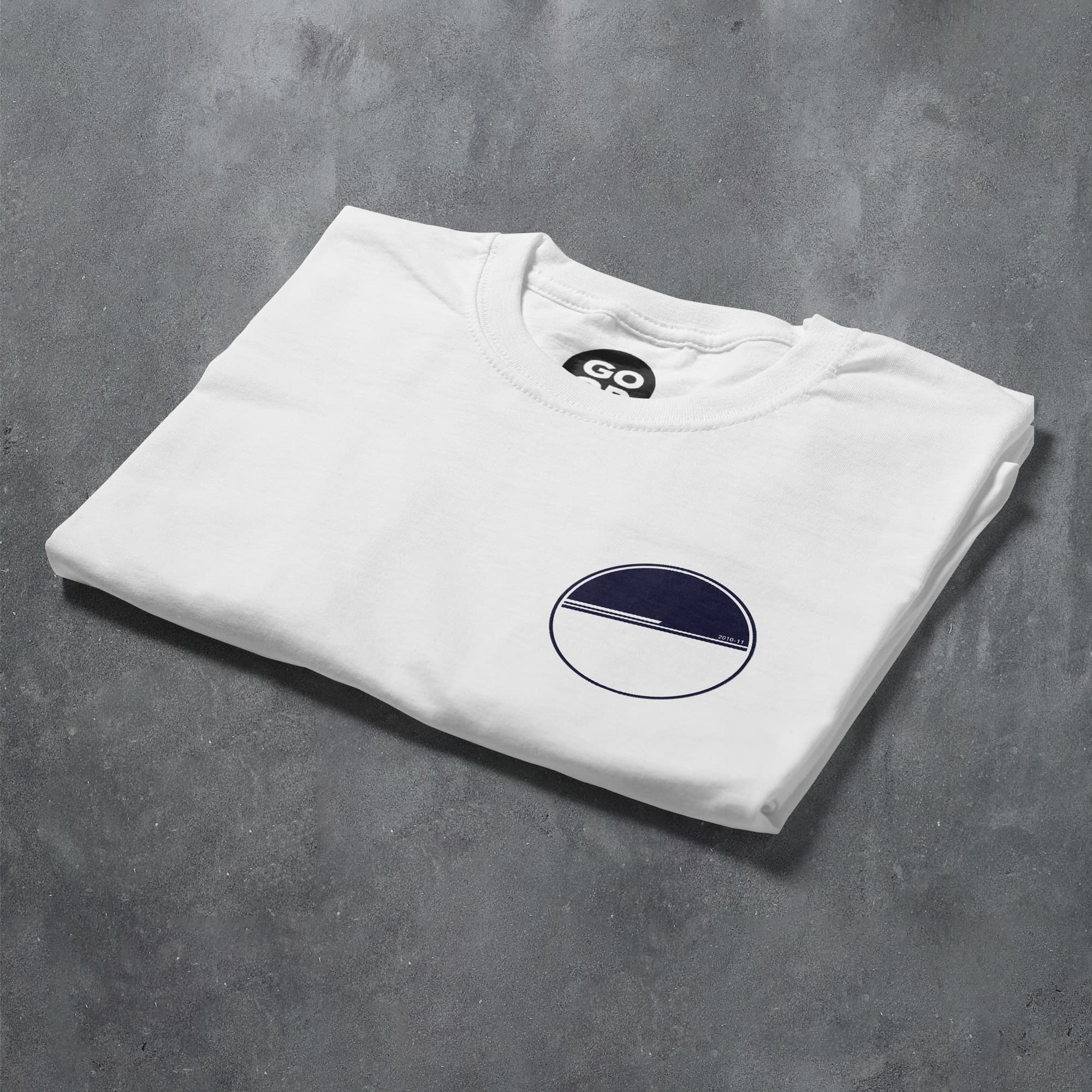a white t - shirt with a blue circle on it