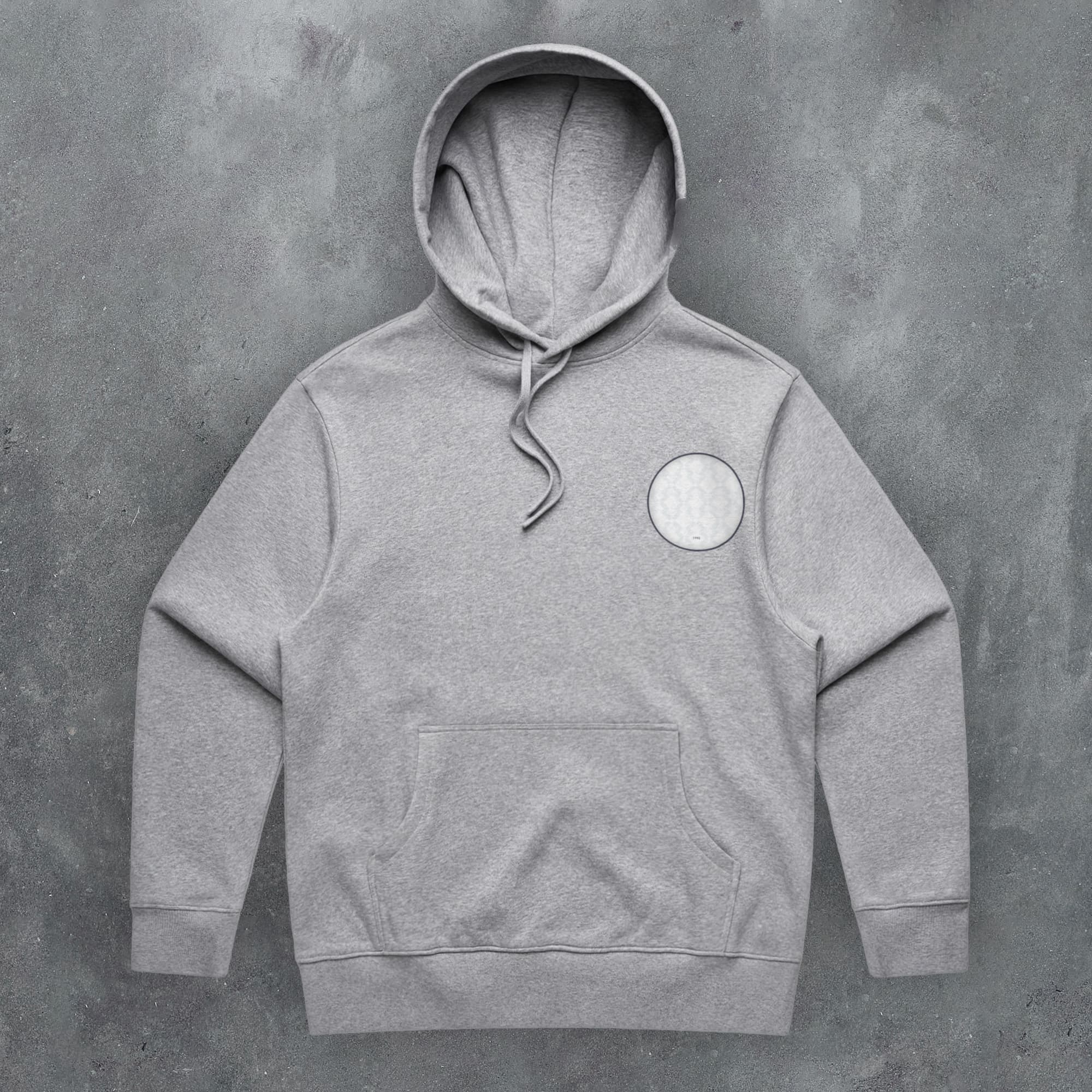 a grey hoodie with a white circle on it