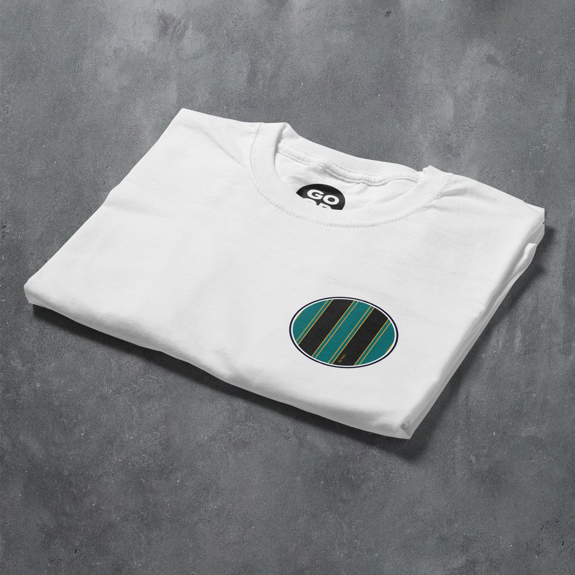 a white t - shirt with a green and black stripe on it