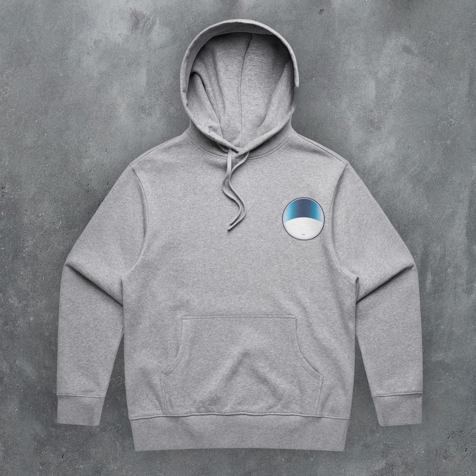 a grey hoodie with a blue and white circle on it