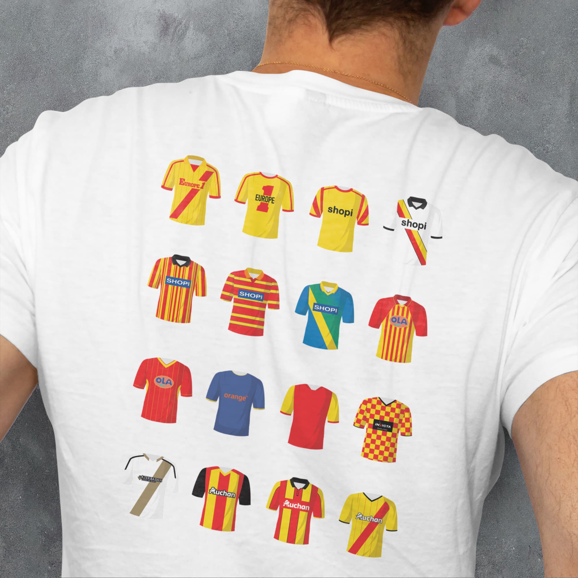 a man wearing a t - shirt with a bunch of different shirts on it