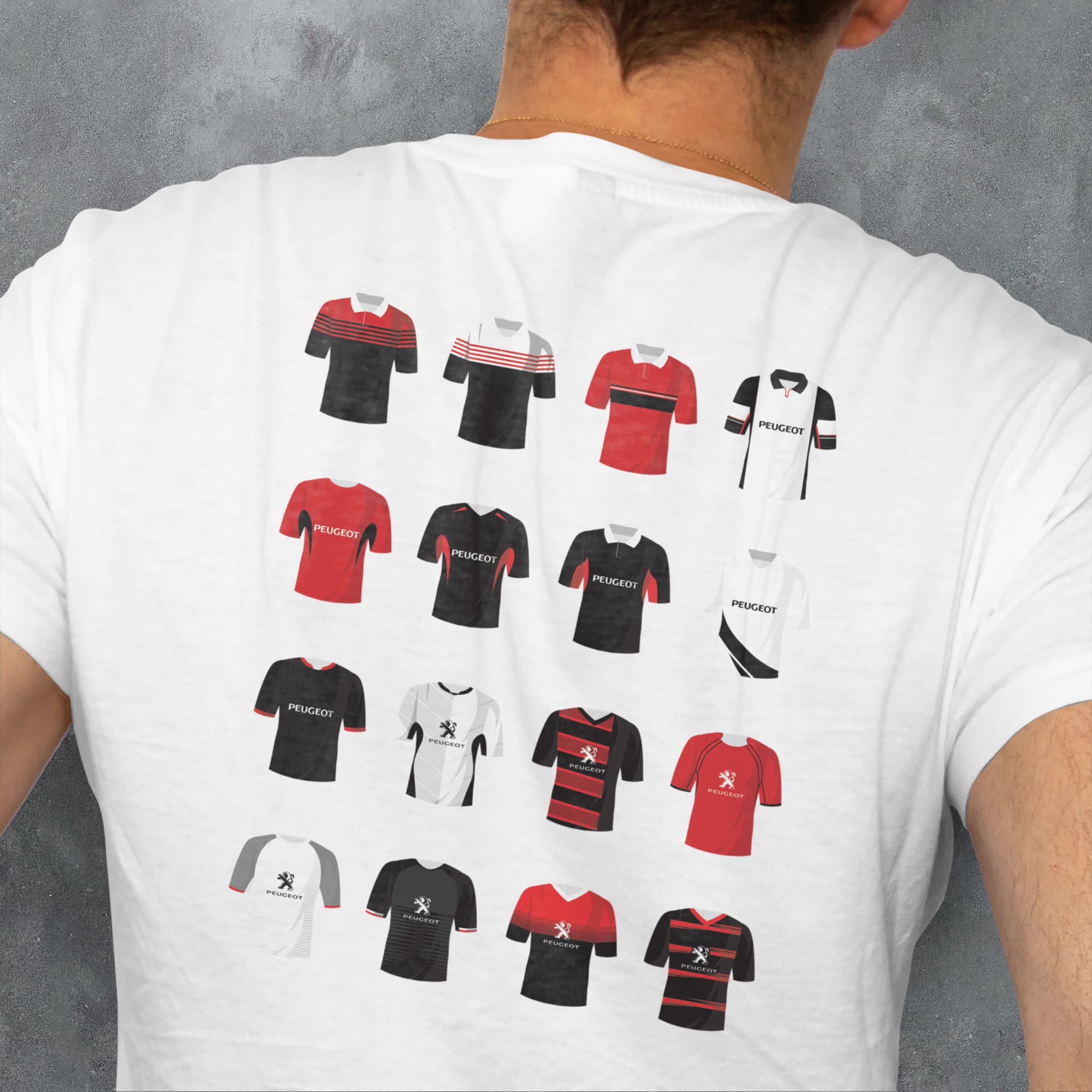 a man wearing a t - shirt with a bunch of different shirts on it