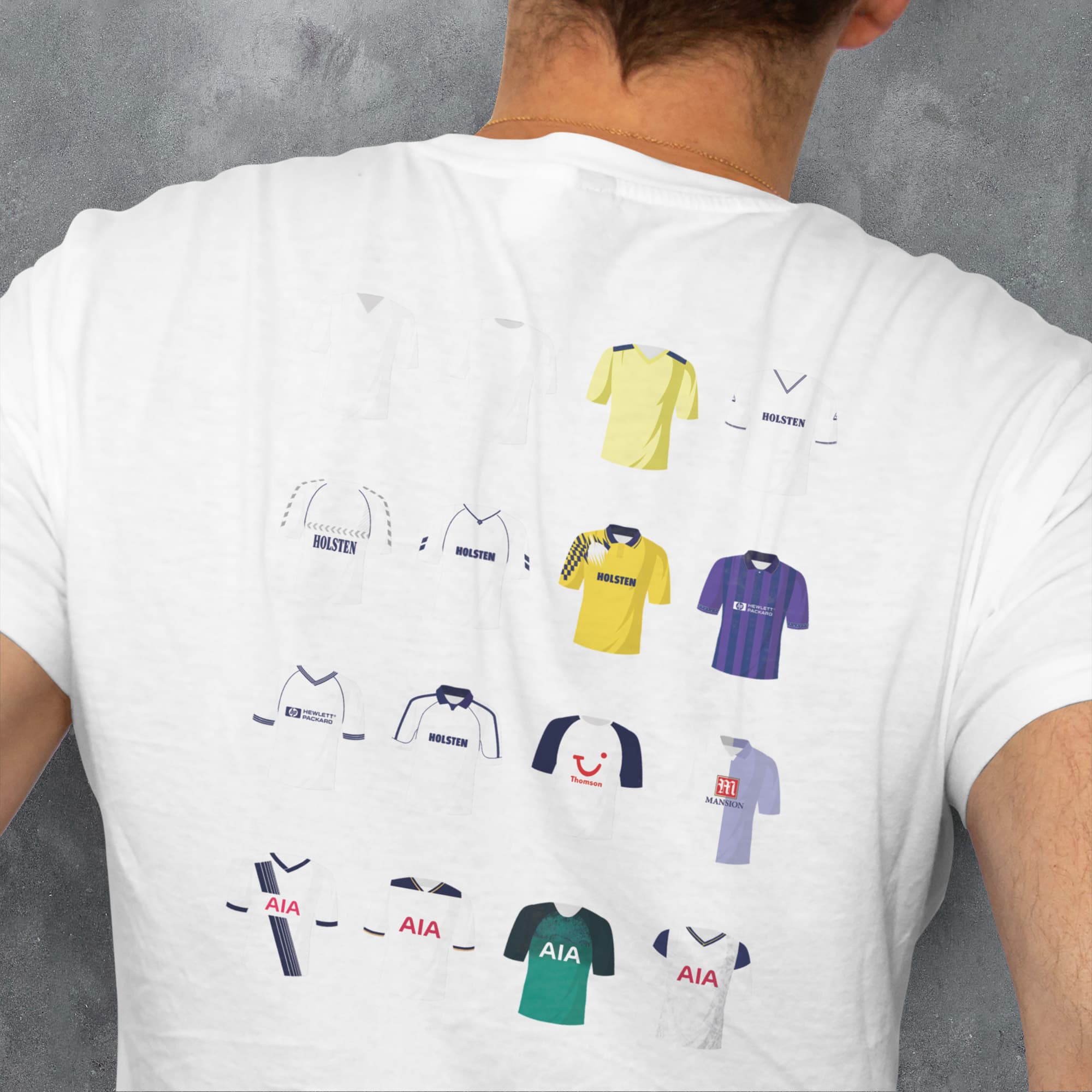 a man wearing a t - shirt with a bunch of different shirts on it