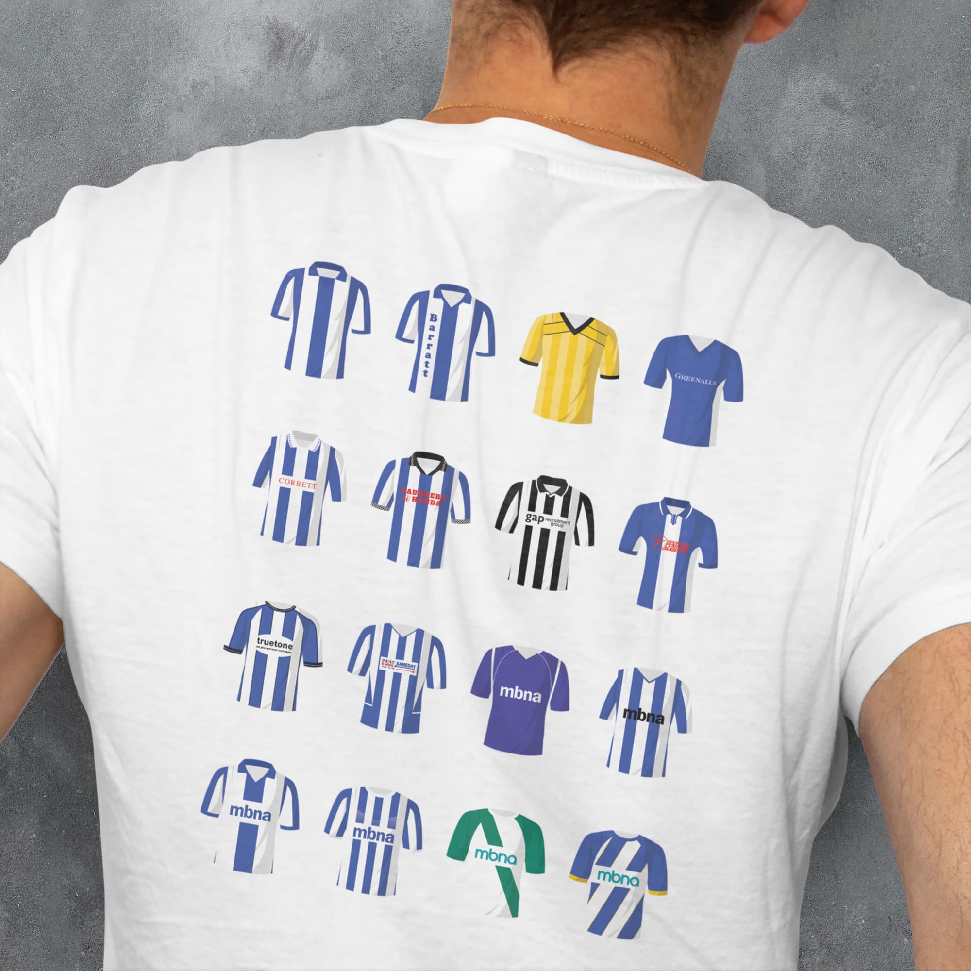 a man wearing a t - shirt with a bunch of different shirts on it