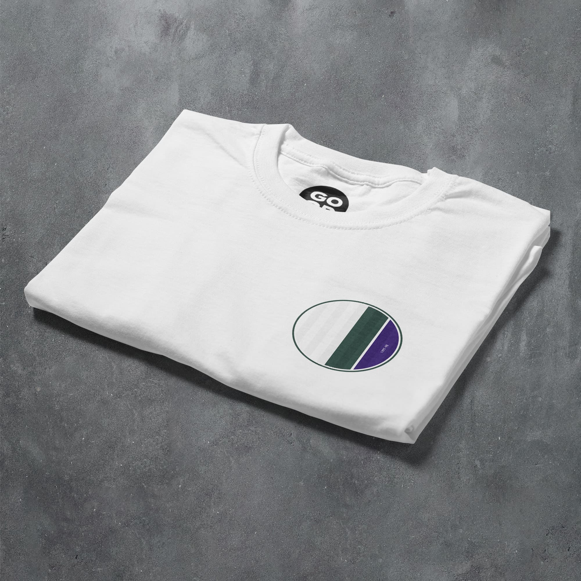 a white t - shirt with a green and purple circle on it