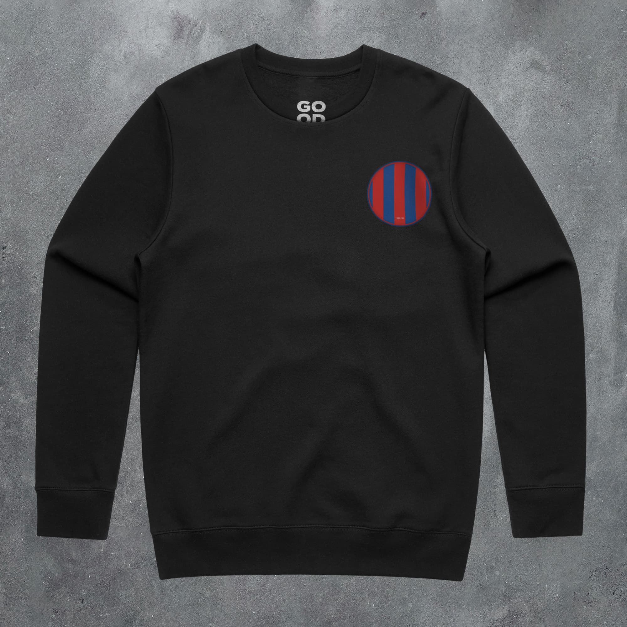 a black sweatshirt with red and blue stripes