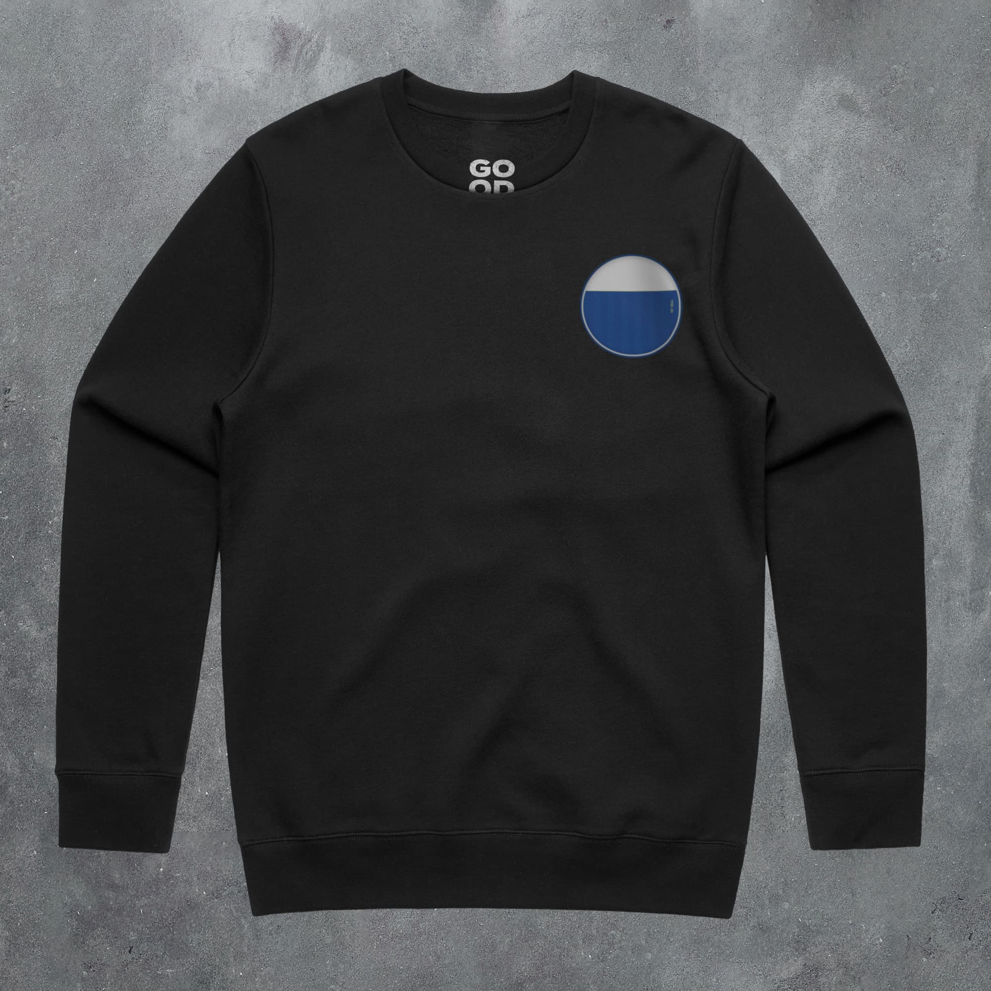 a black sweatshirt with a blue circle on it