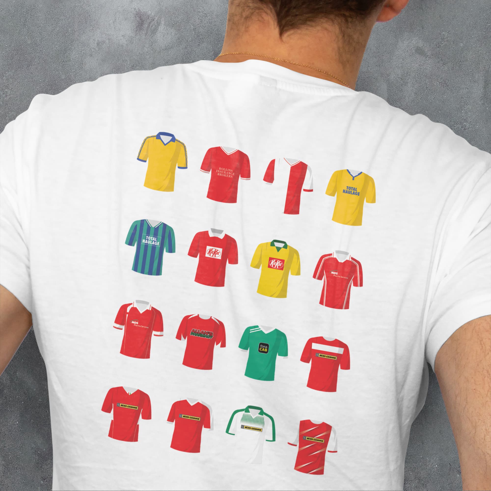 a man wearing a t - shirt with different colored shirts on it