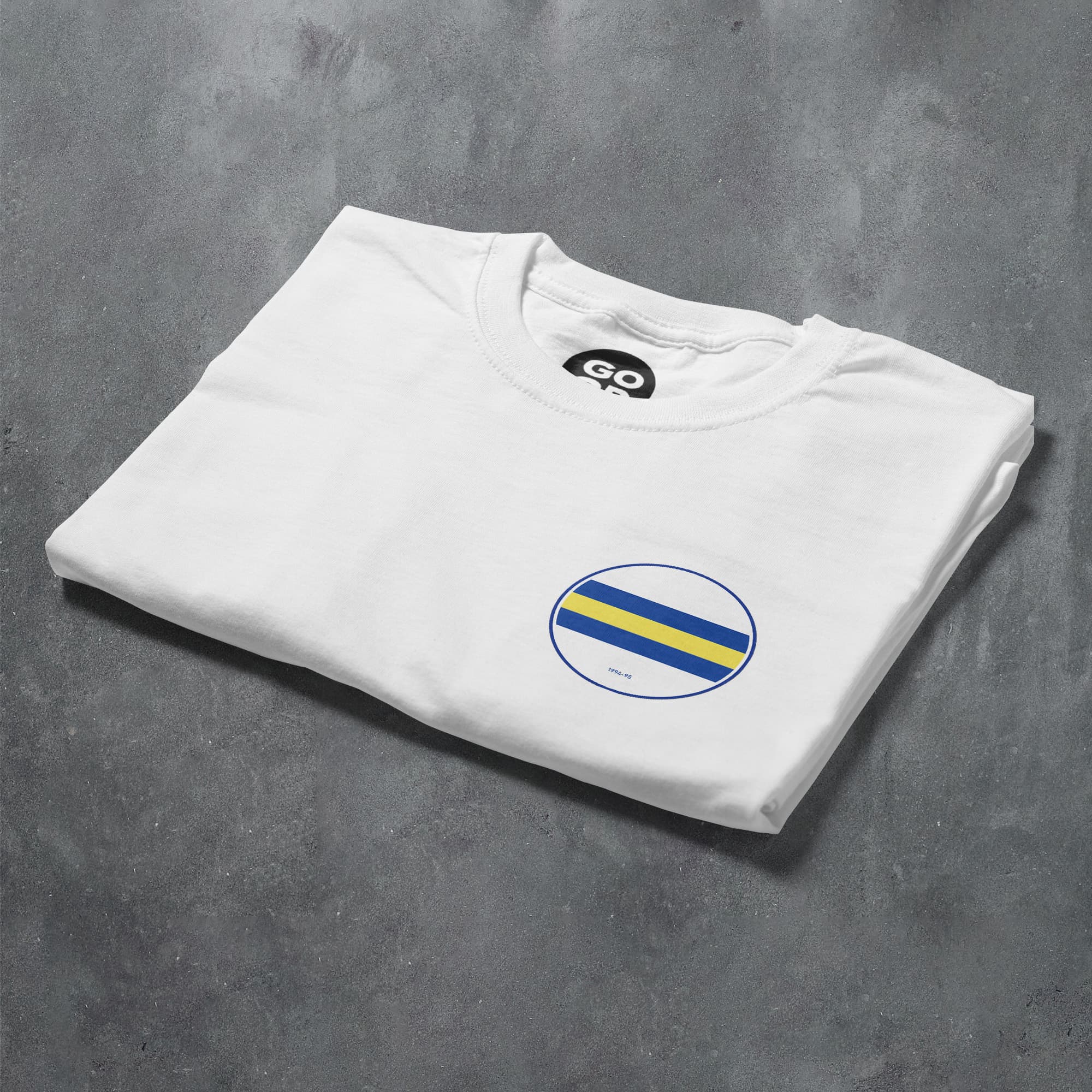 a white t - shirt with a blue and yellow stripe on it