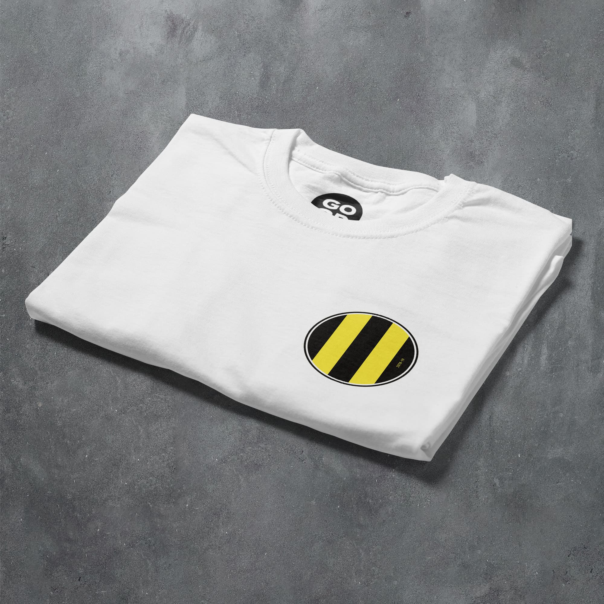 a white t - shirt with a black and yellow logo