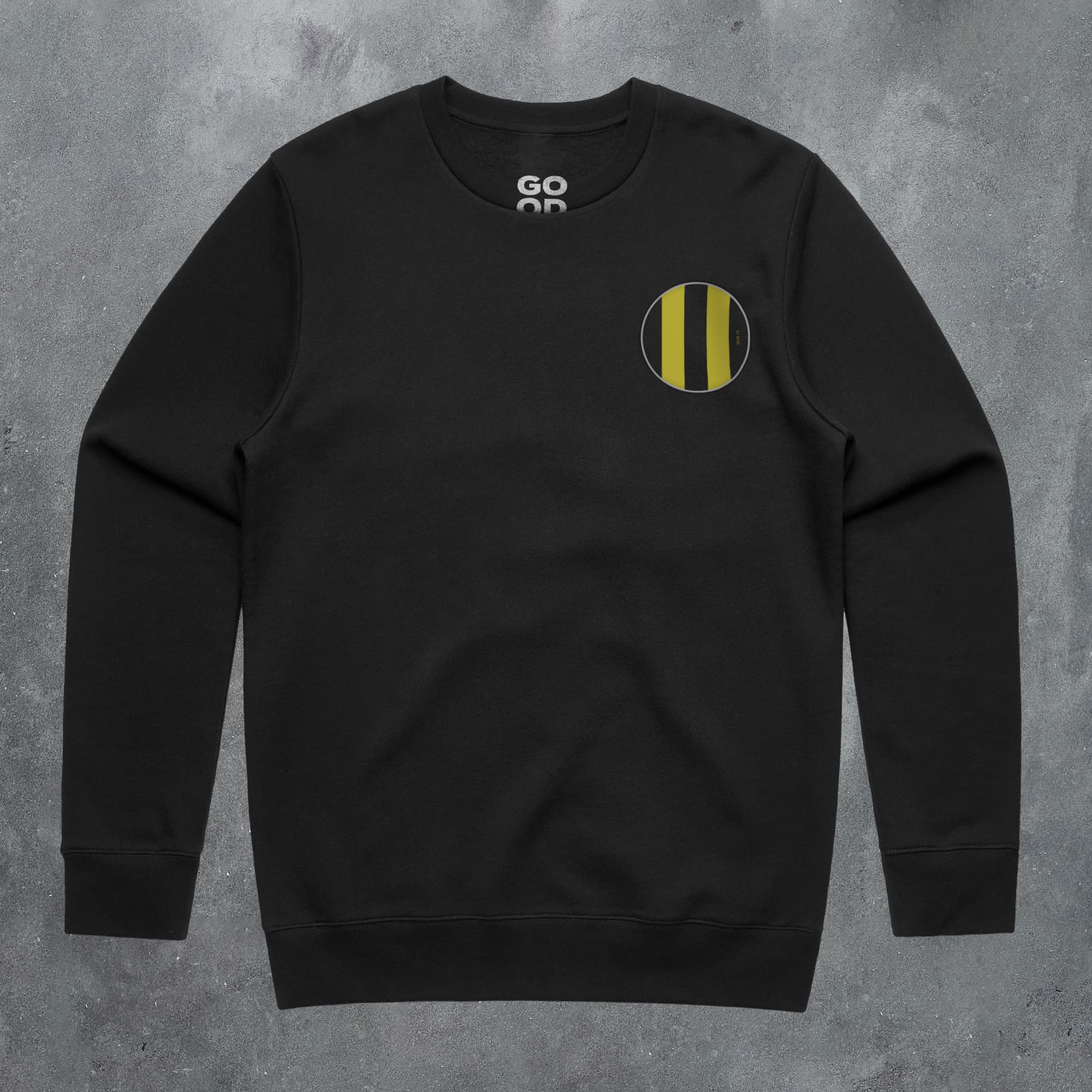 a black sweatshirt with a yellow and black stripe on the chest
