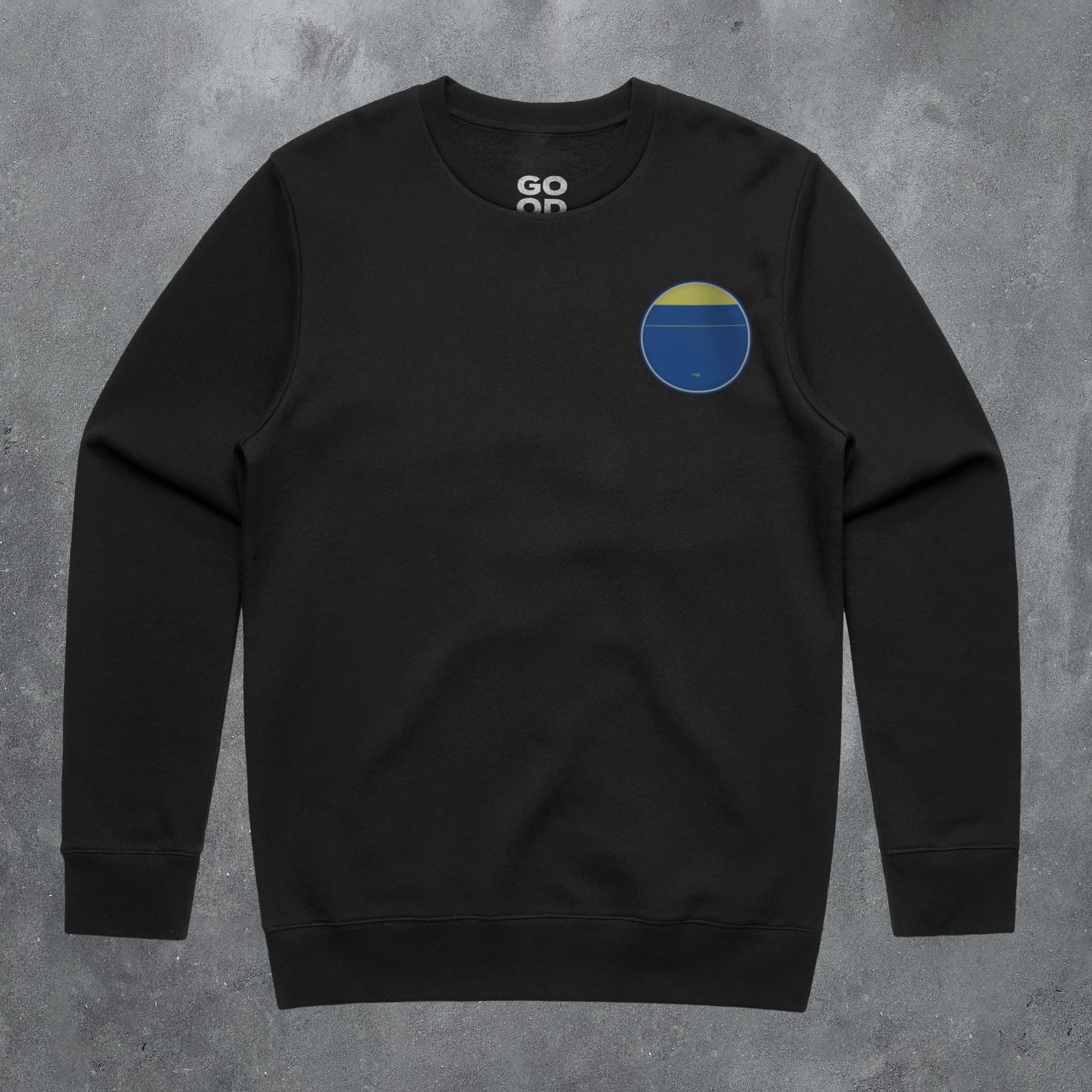 a black sweatshirt with a blue and yellow circle on it