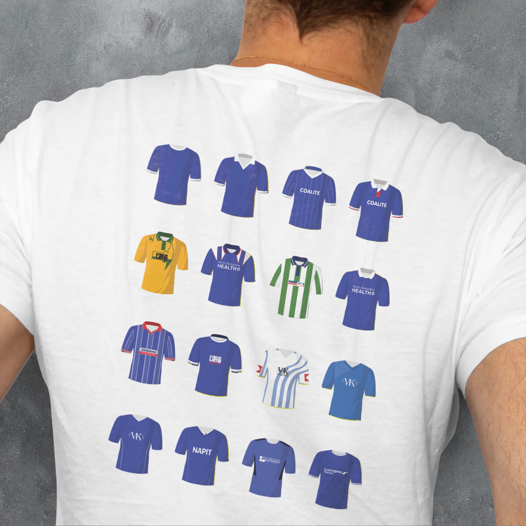 a man wearing a t - shirt with a bunch of different shirts on it