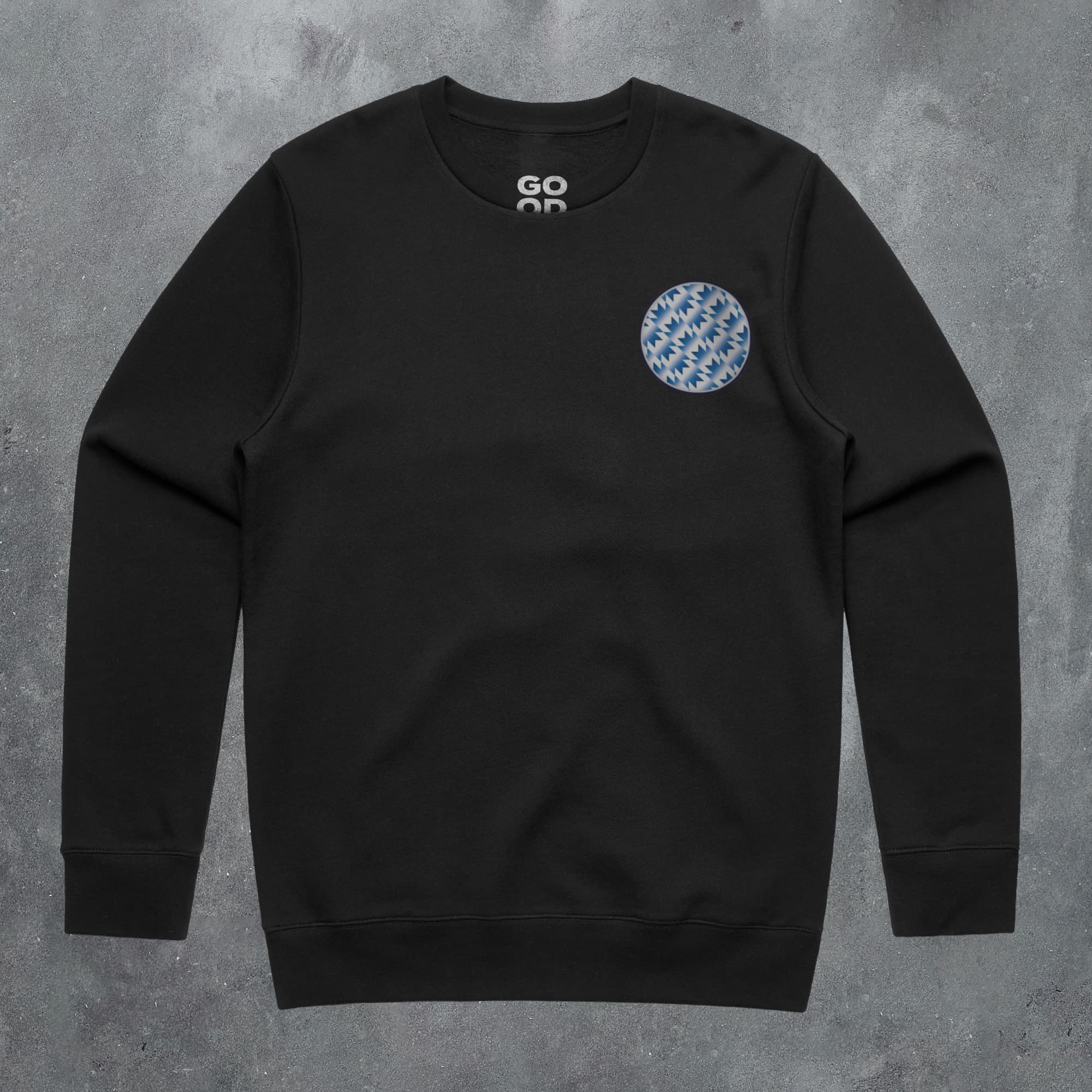 a black sweatshirt with a blue and white pattern on the chest