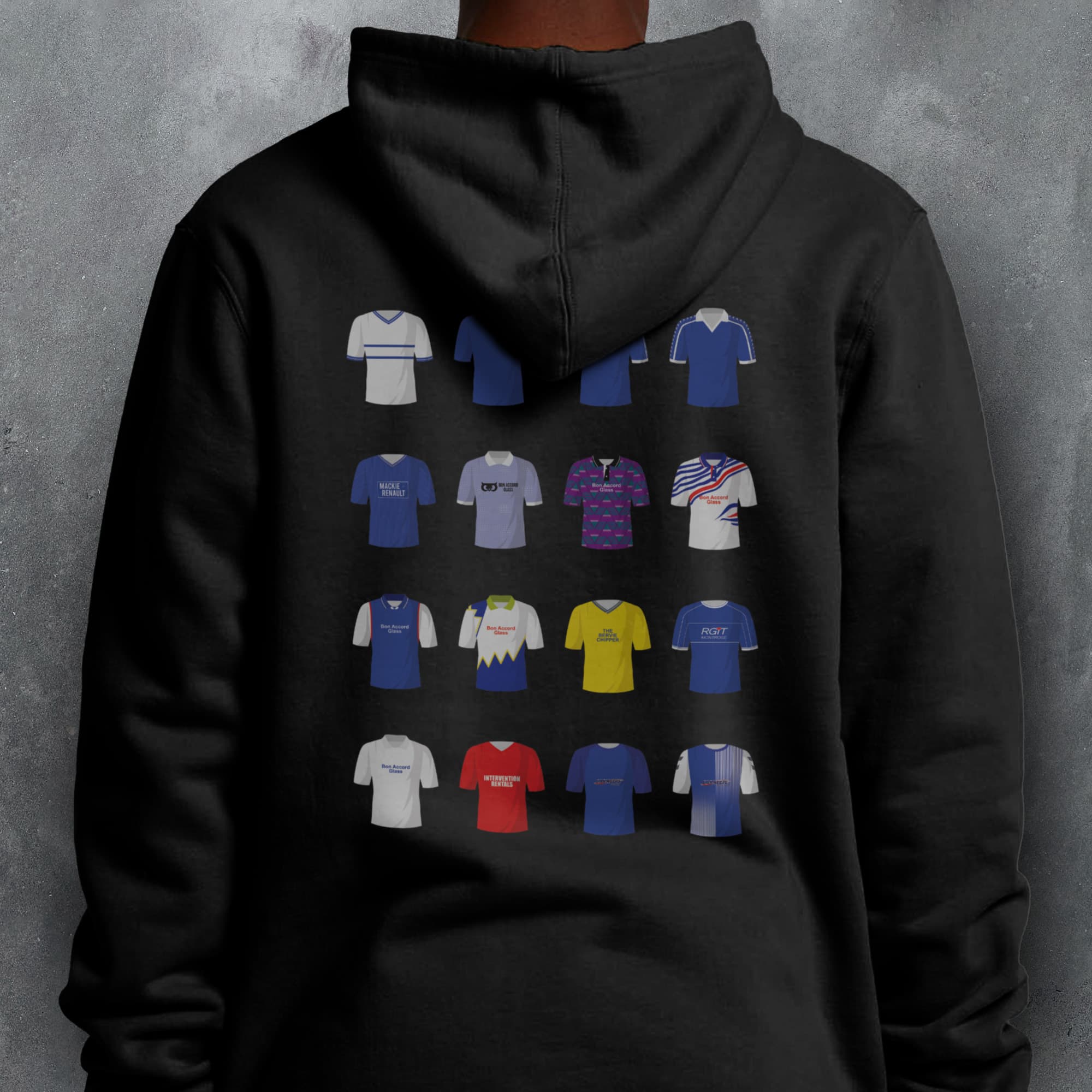 a person wearing a hoodie with a bunch of shirts on it