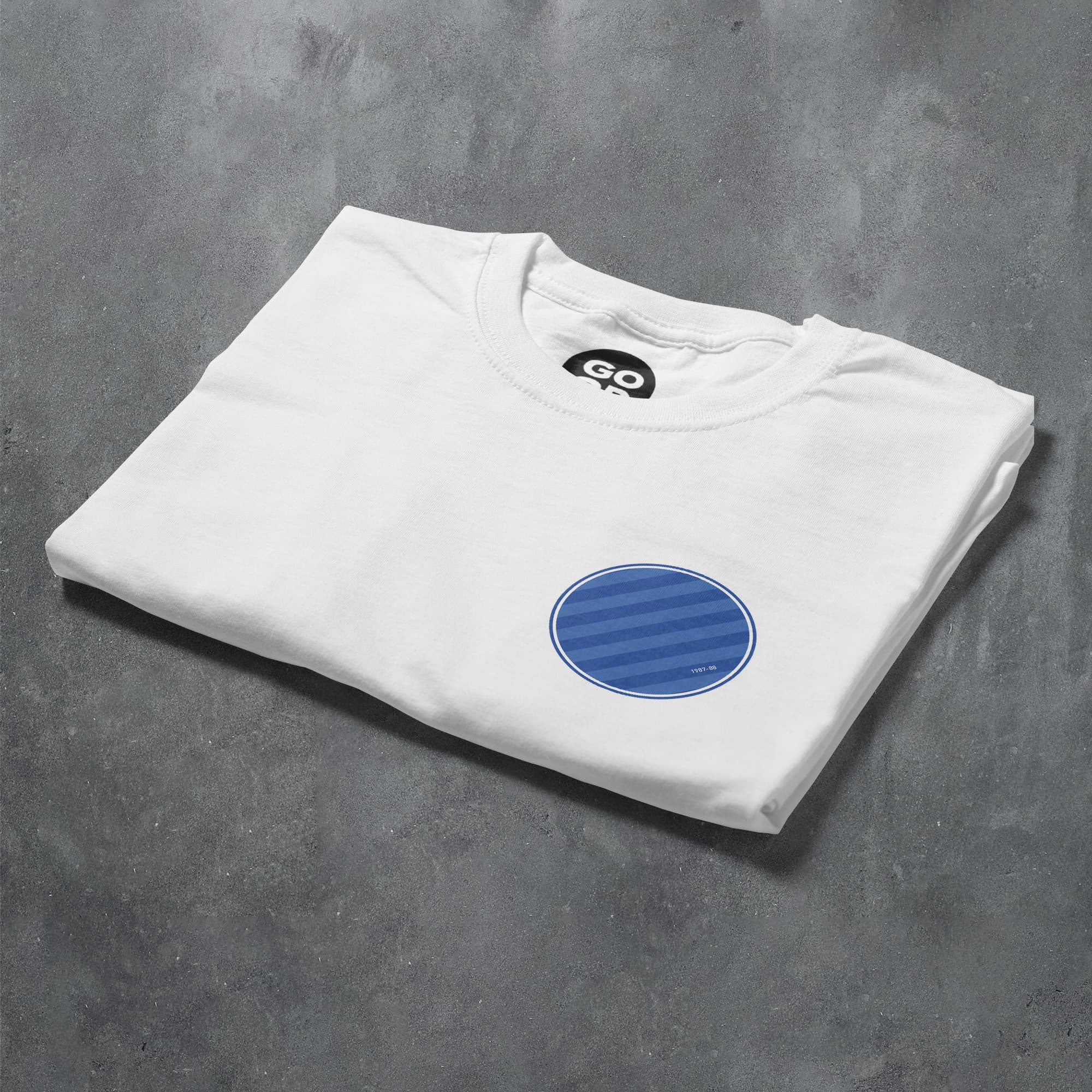 a white t - shirt with a blue circle on it